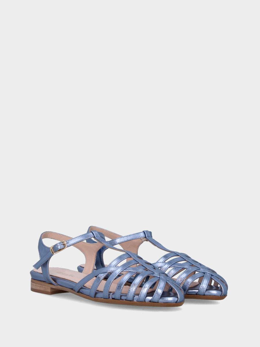 Blue sandal in laminated leather with a basket of straps