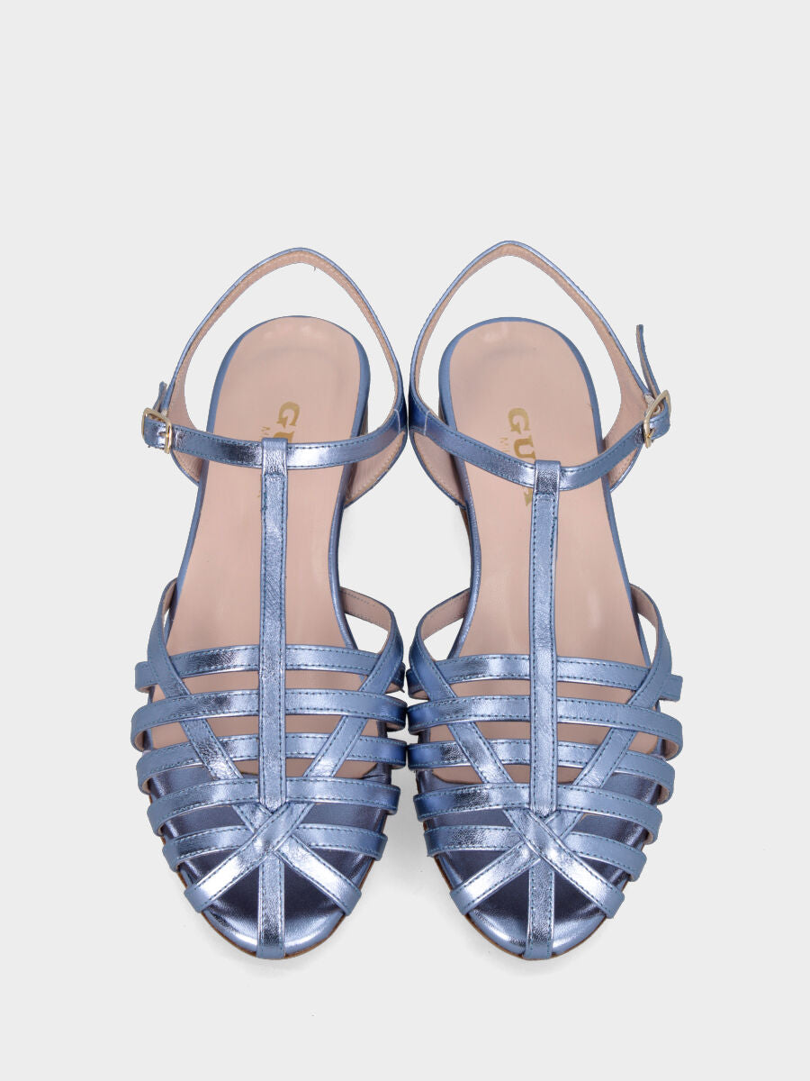 Blue sandal in laminated leather with a basket of straps