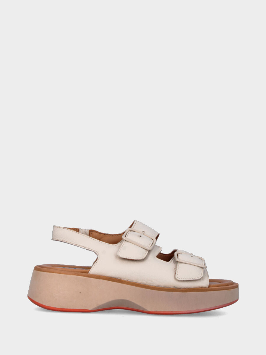 White leather sandal with buckles and wavy sole