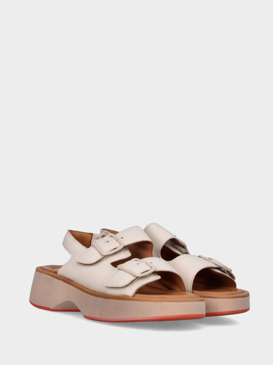 White leather sandal with buckles and wavy sole