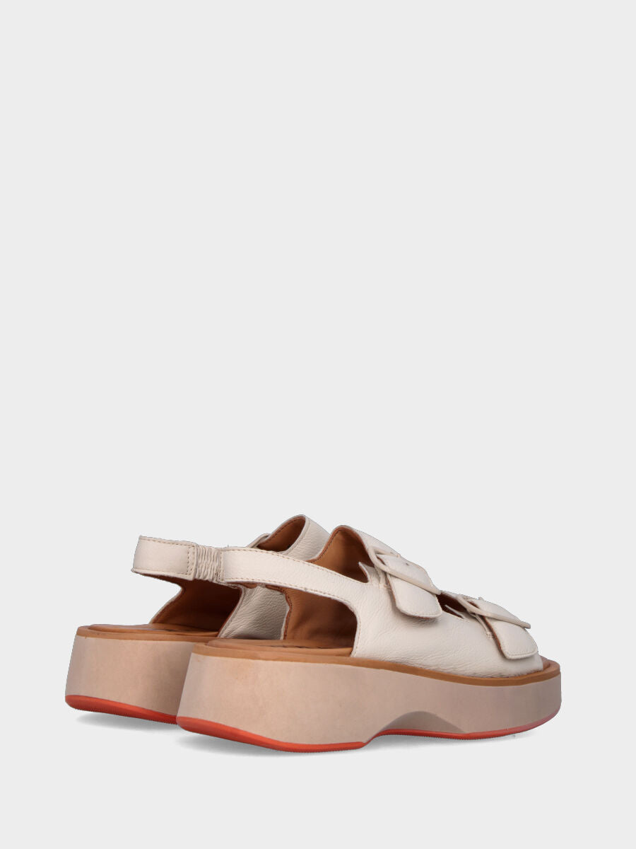 White leather sandal with buckles and wavy sole