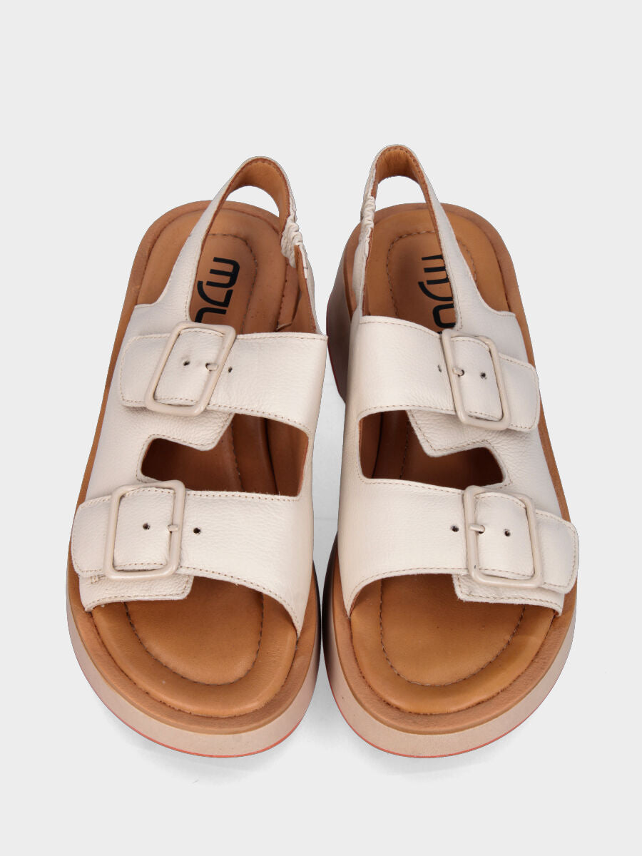 White leather sandal with buckles and wavy sole