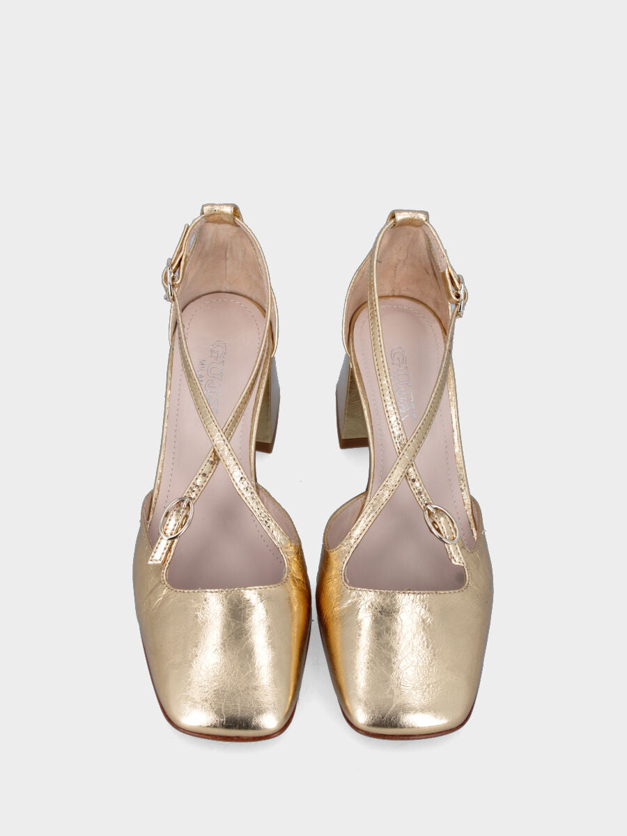 Gold pumps in laminated leather with crossed straps