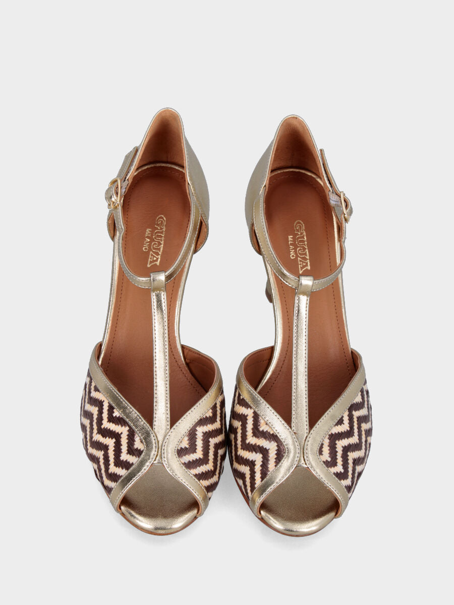 Décolleté modello charleston platino in pelle laminata con intreccio