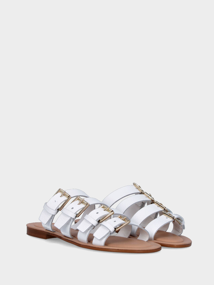 Mule blanche en cuir avec quatre boucles