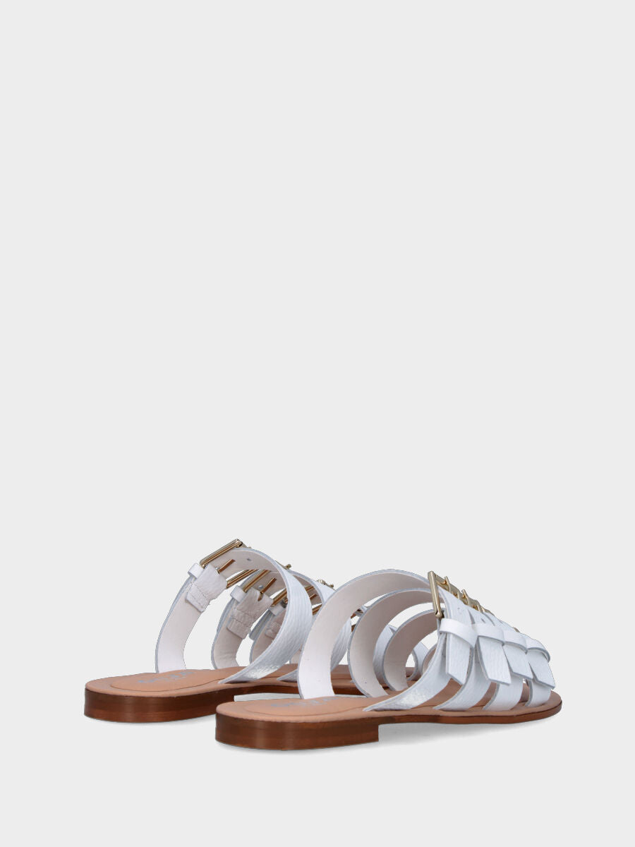 Mule blanche en cuir avec quatre boucles