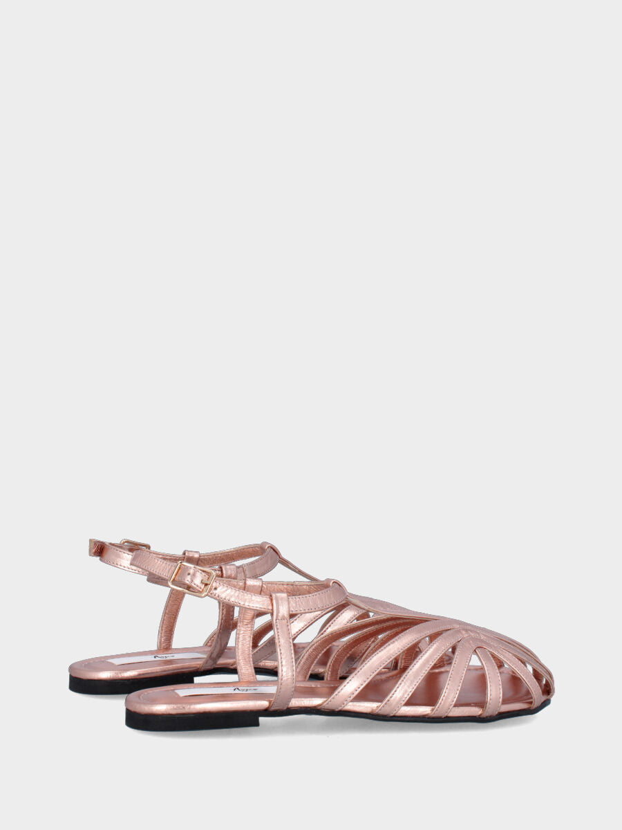 Sandalo flat in laminato rosa con listini arcuati