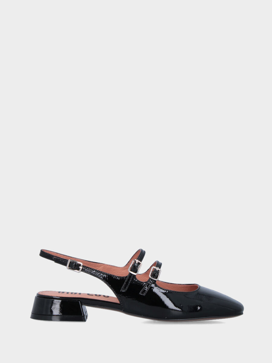 Slingback in vernice nera con cinturini e punta stondata