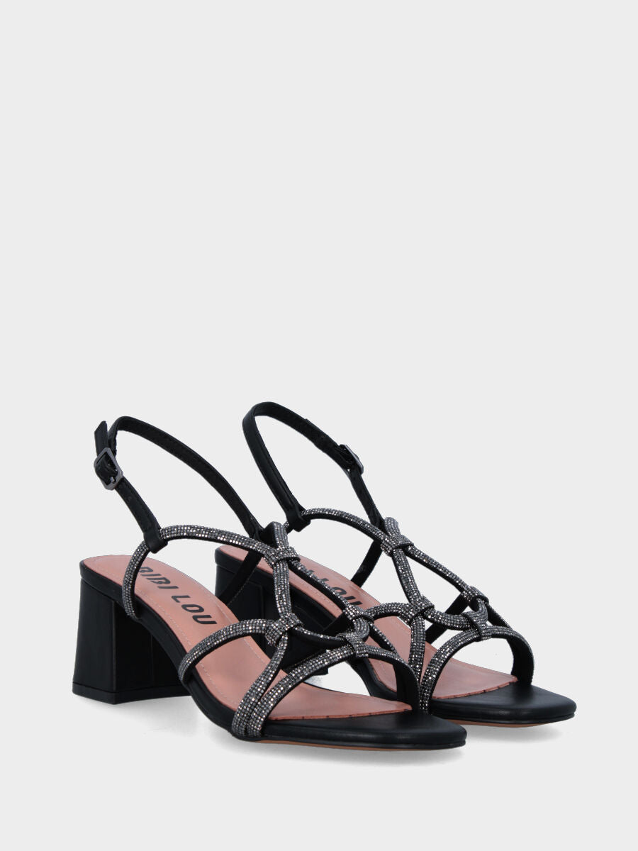 Sandalo in nappa nera con listini tubolari e mini cristalli