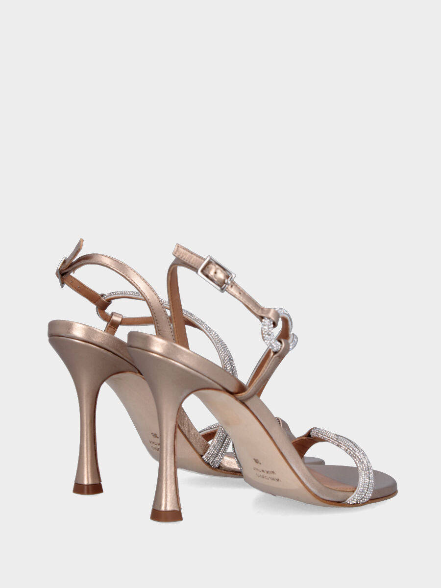 Sandalo in laminato beige con listini tubolari e tacco incavato