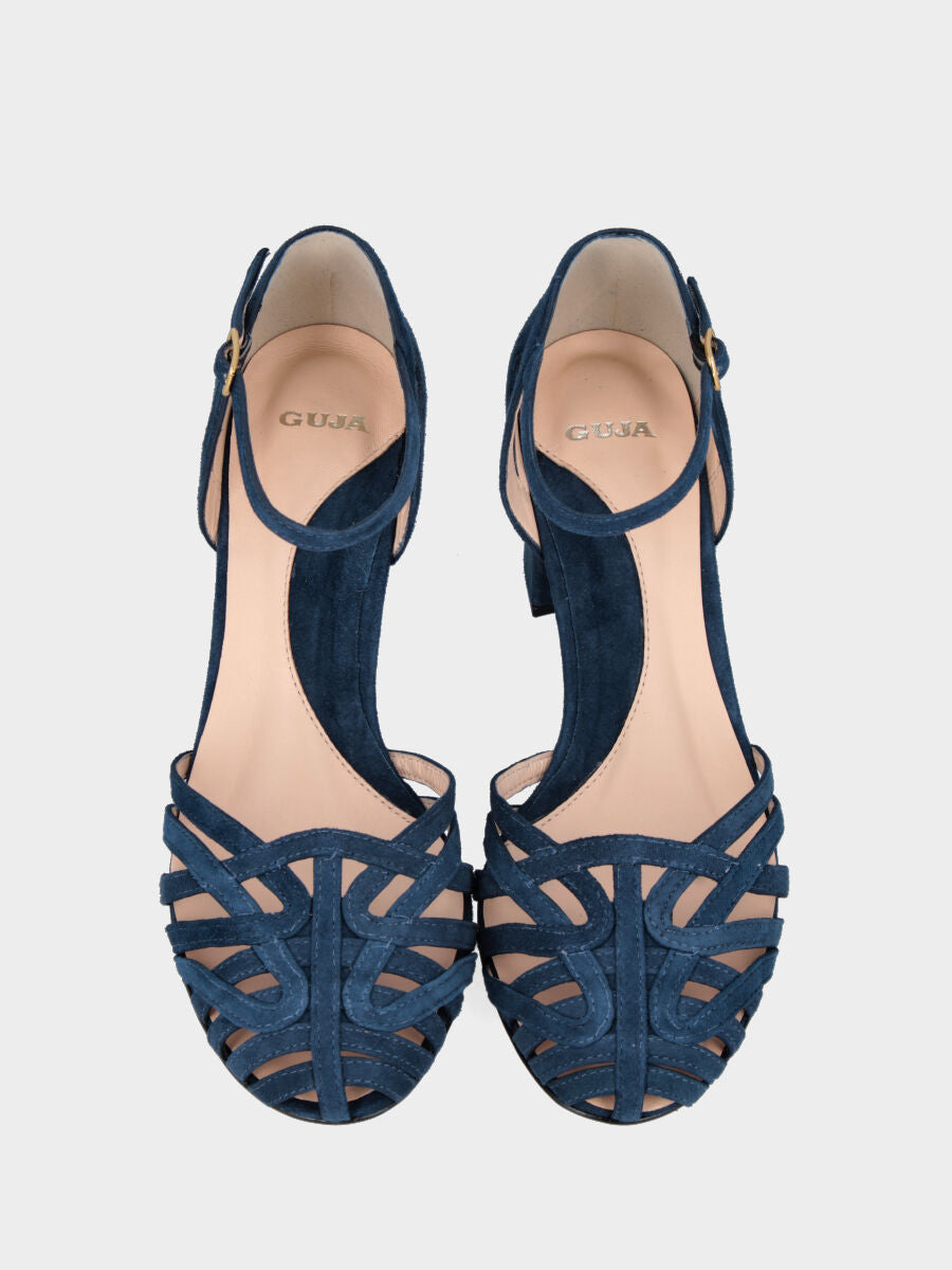 Décolleté in camoscio blu con listini incrociati e tacco a blocco