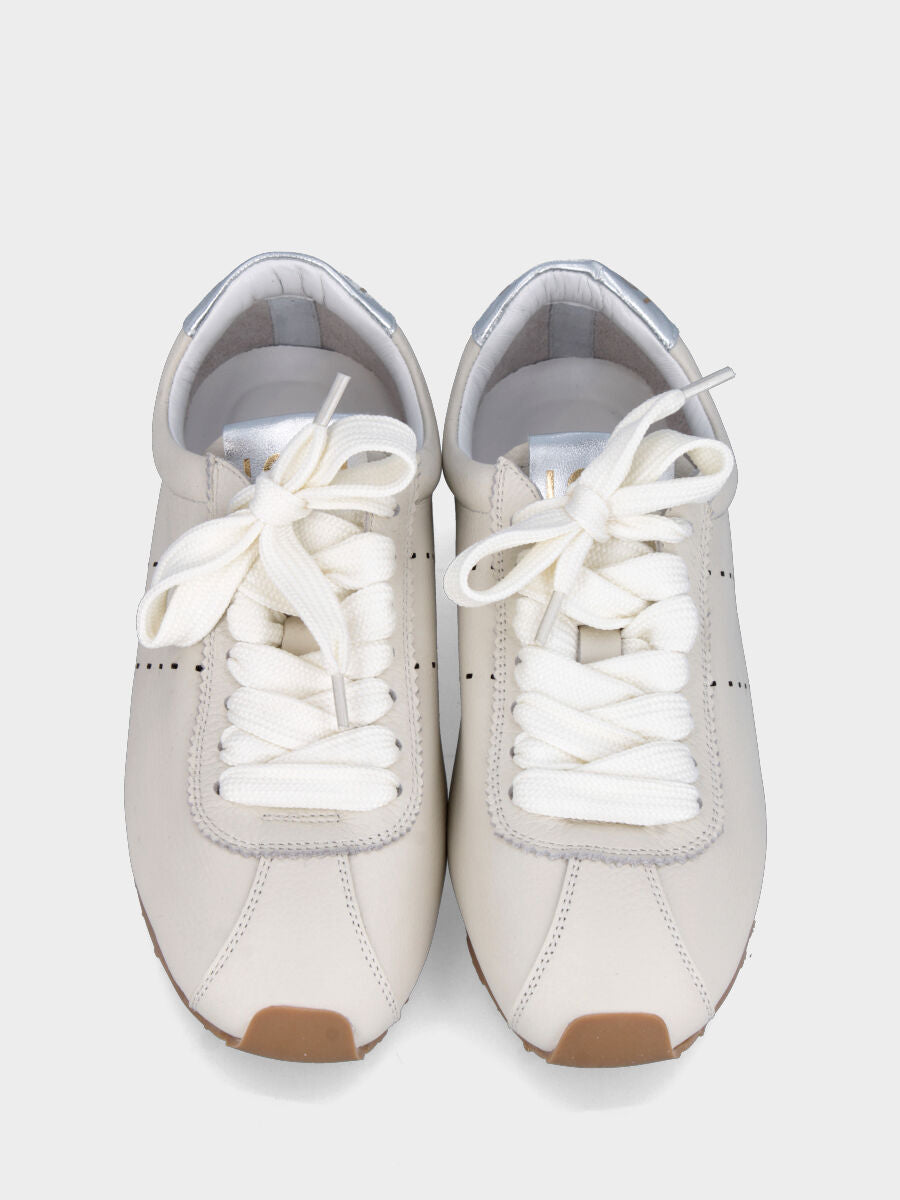 Sneaker in vitello bianco con toppone laminato e zeppa