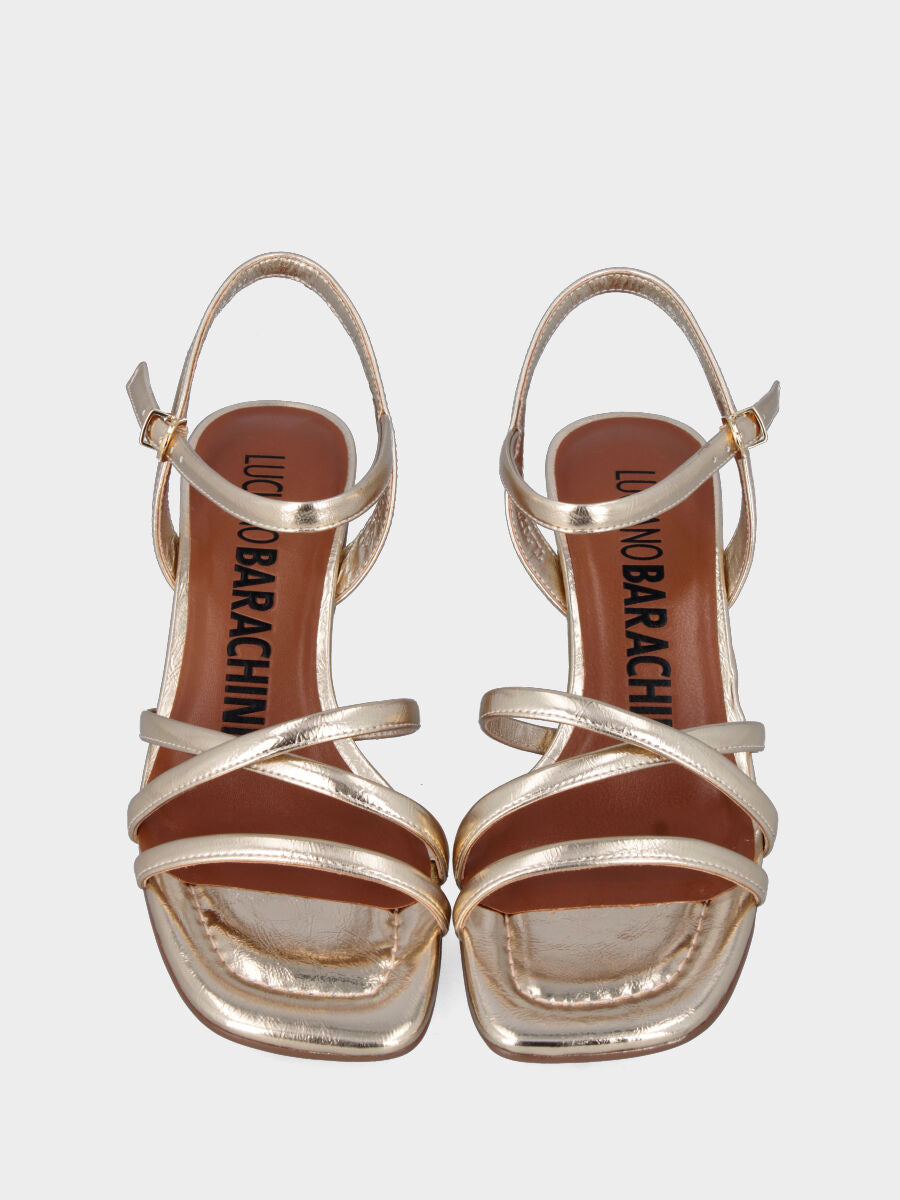 Sandalo in laminato platino con listini incrociati e tacco a calice