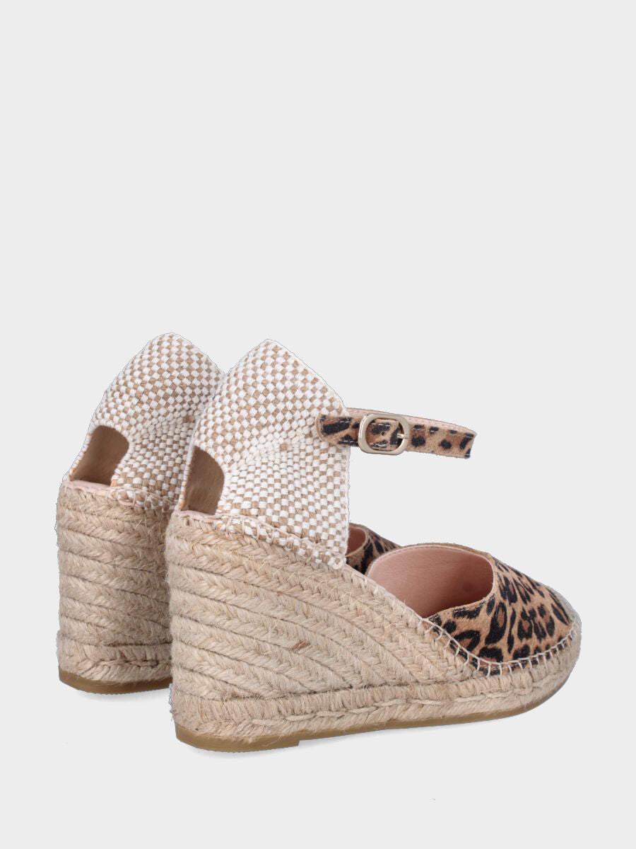 Campesina in camoscio leopardato con zeppa in corda