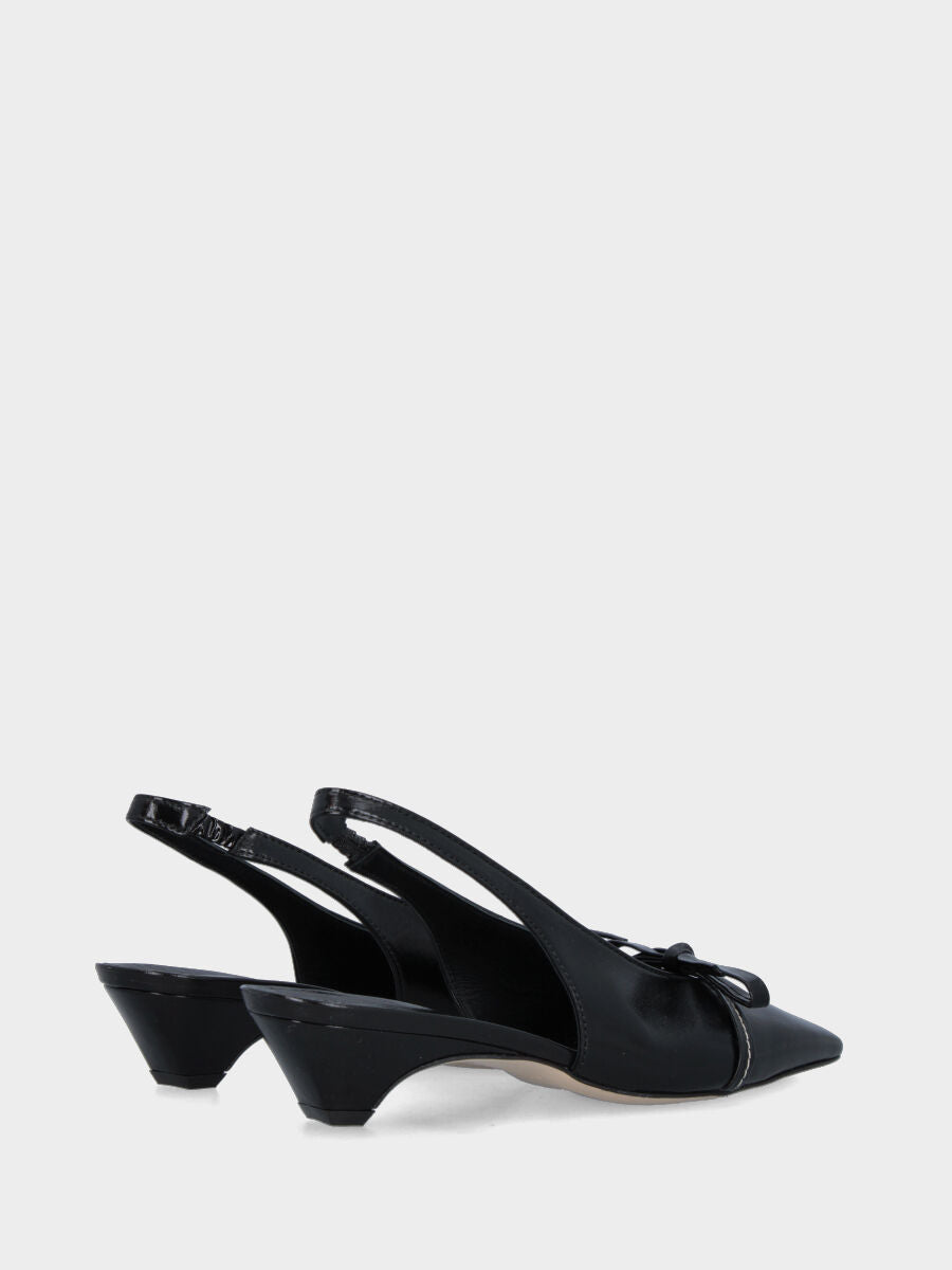 Slingback in verlux nero con tacco semi zeppa e fiocco sulla pianta