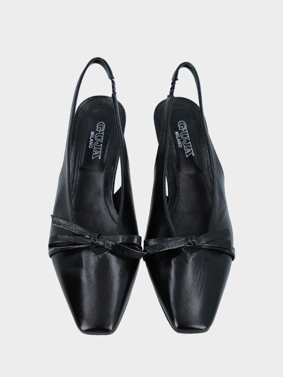 Slingback in verlux nero con tacco semi zeppa e fiocco sulla pianta