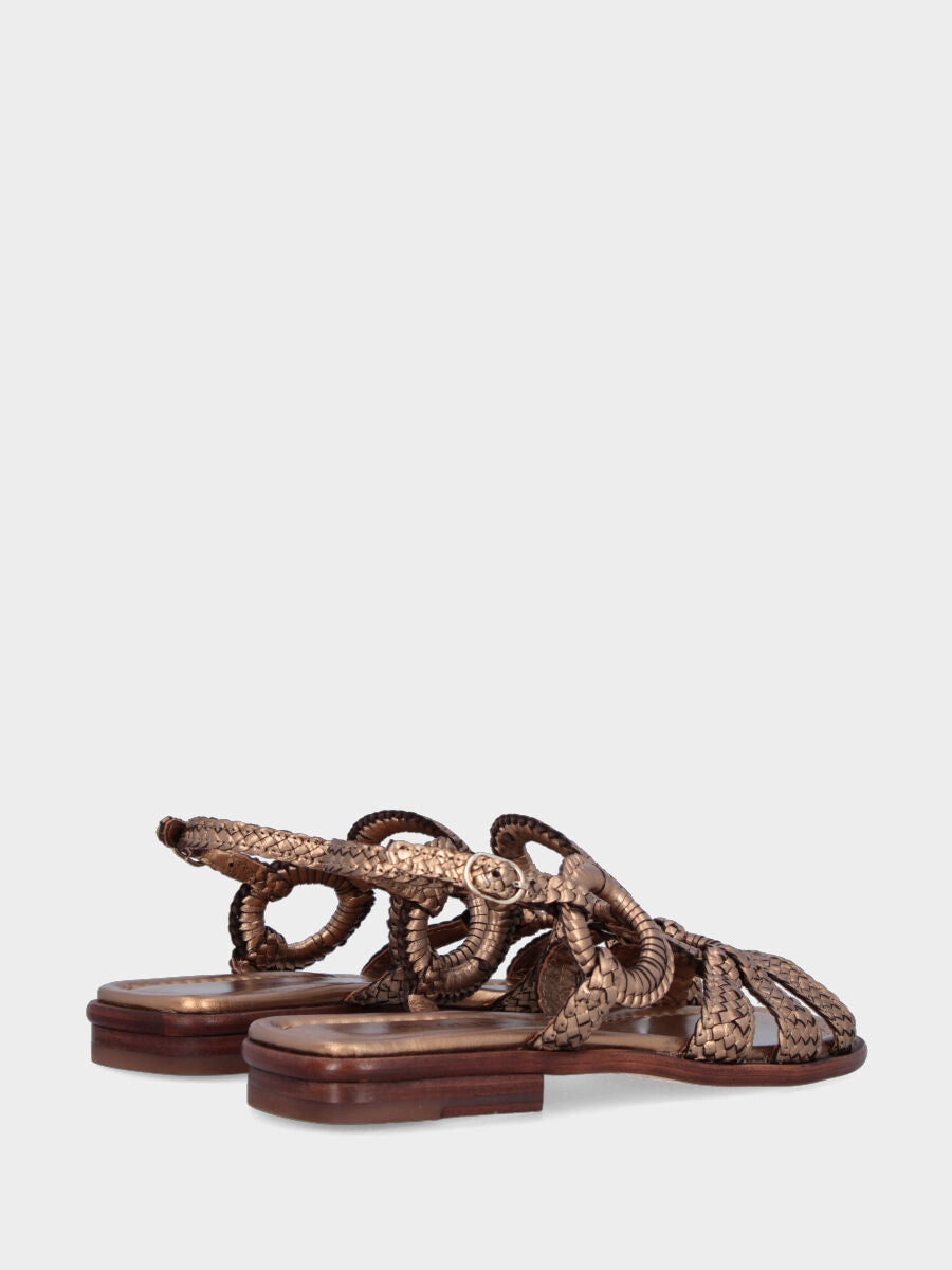 Sandalo in laminato bronzo con intrecci e cerchi ornamentali