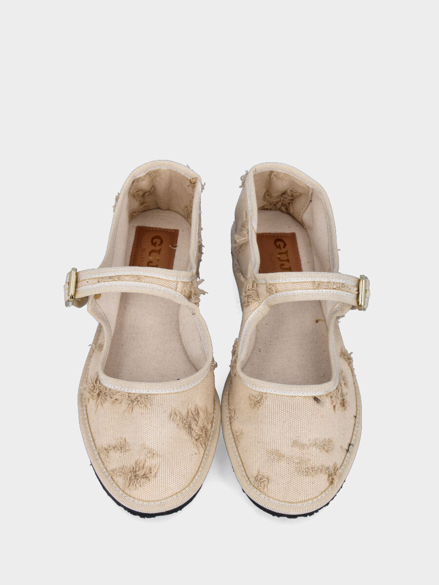 Friulana Mary Jane in tessuto beige con strappi e tacco flat