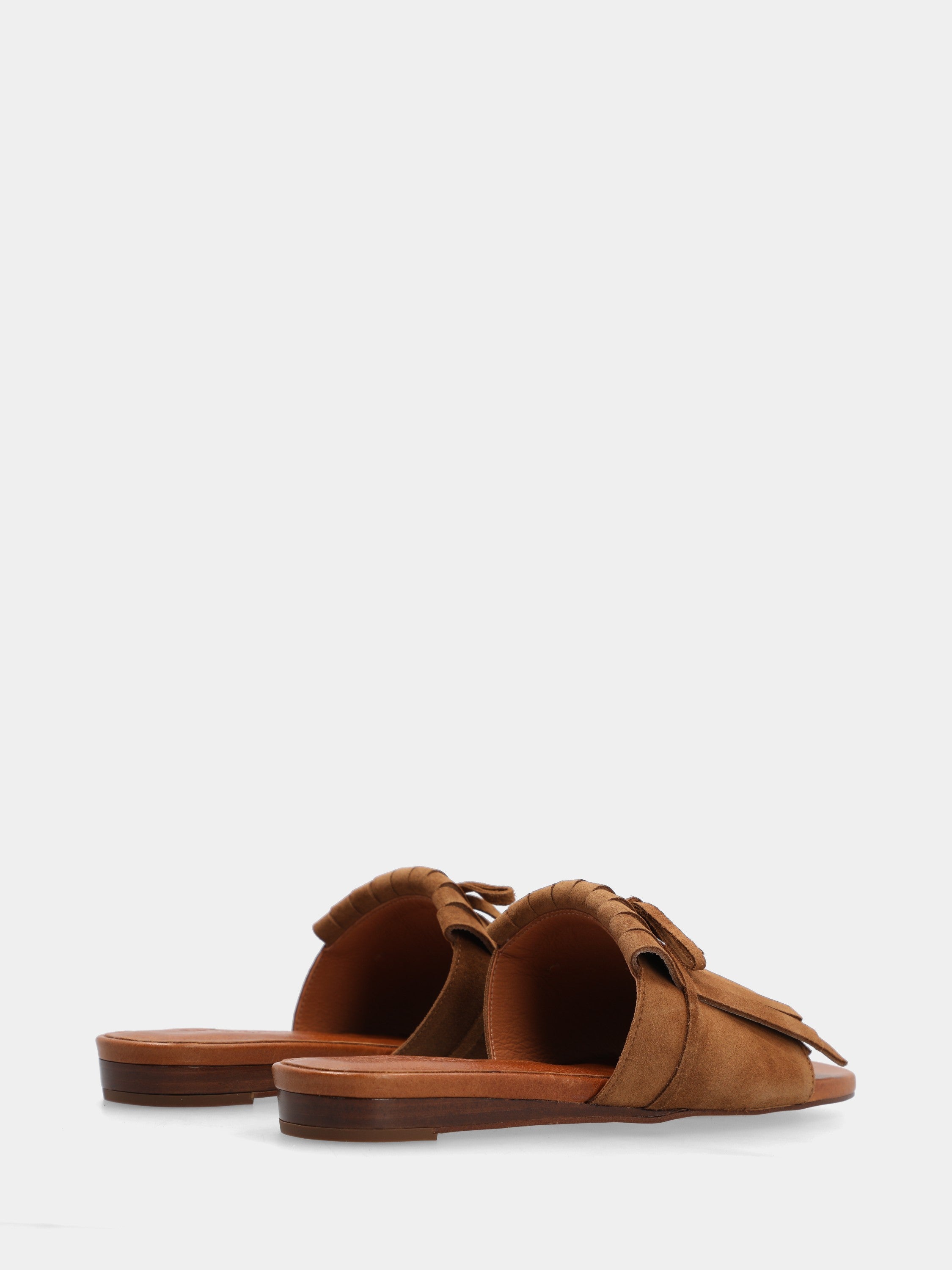 Mule en suède couleur cuir avec plateforme compensée et double frange