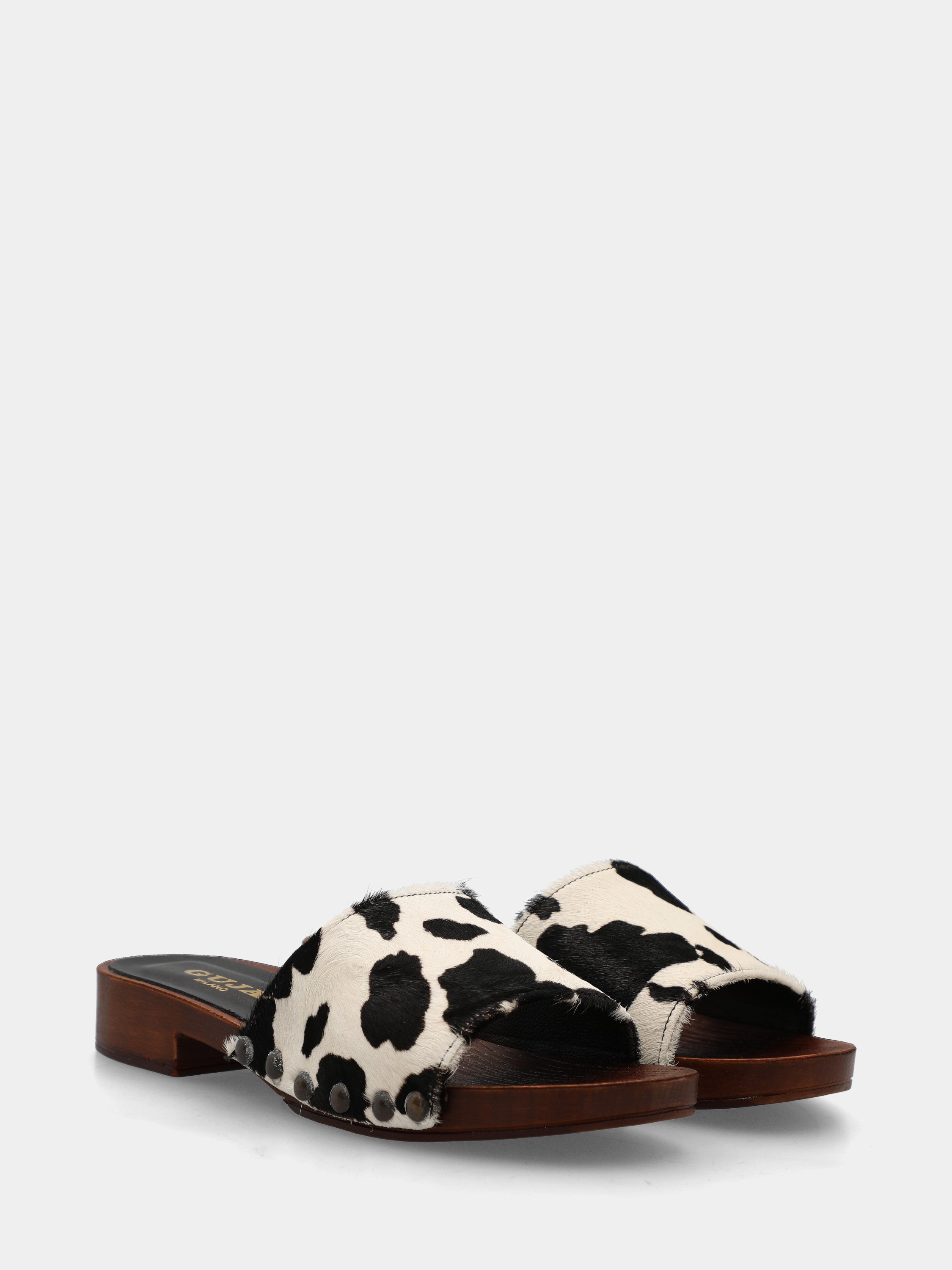 Sabot in cavallino animalier con fascia chiodata