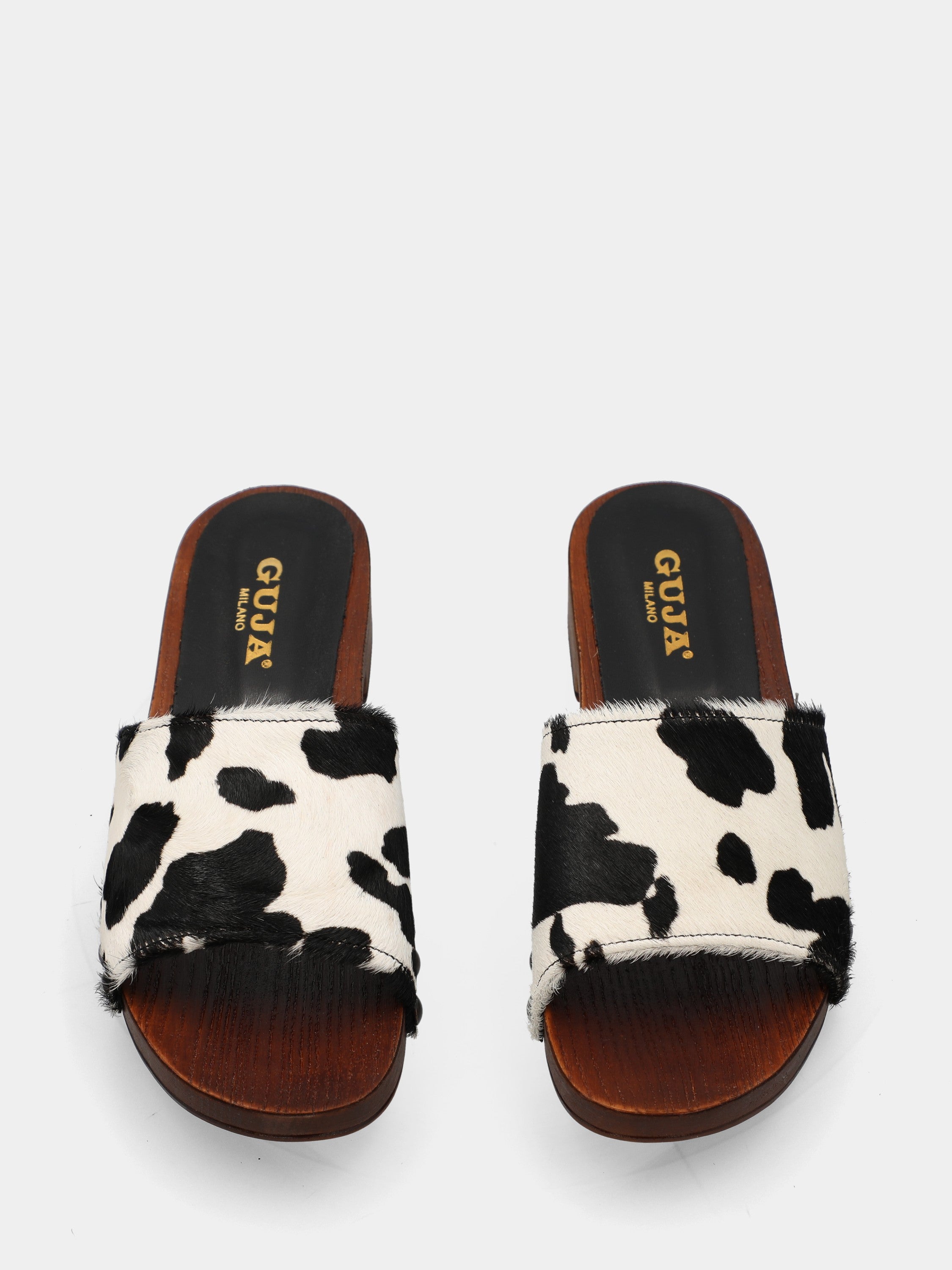 Sabot in cavallino animalier con fascia chiodata