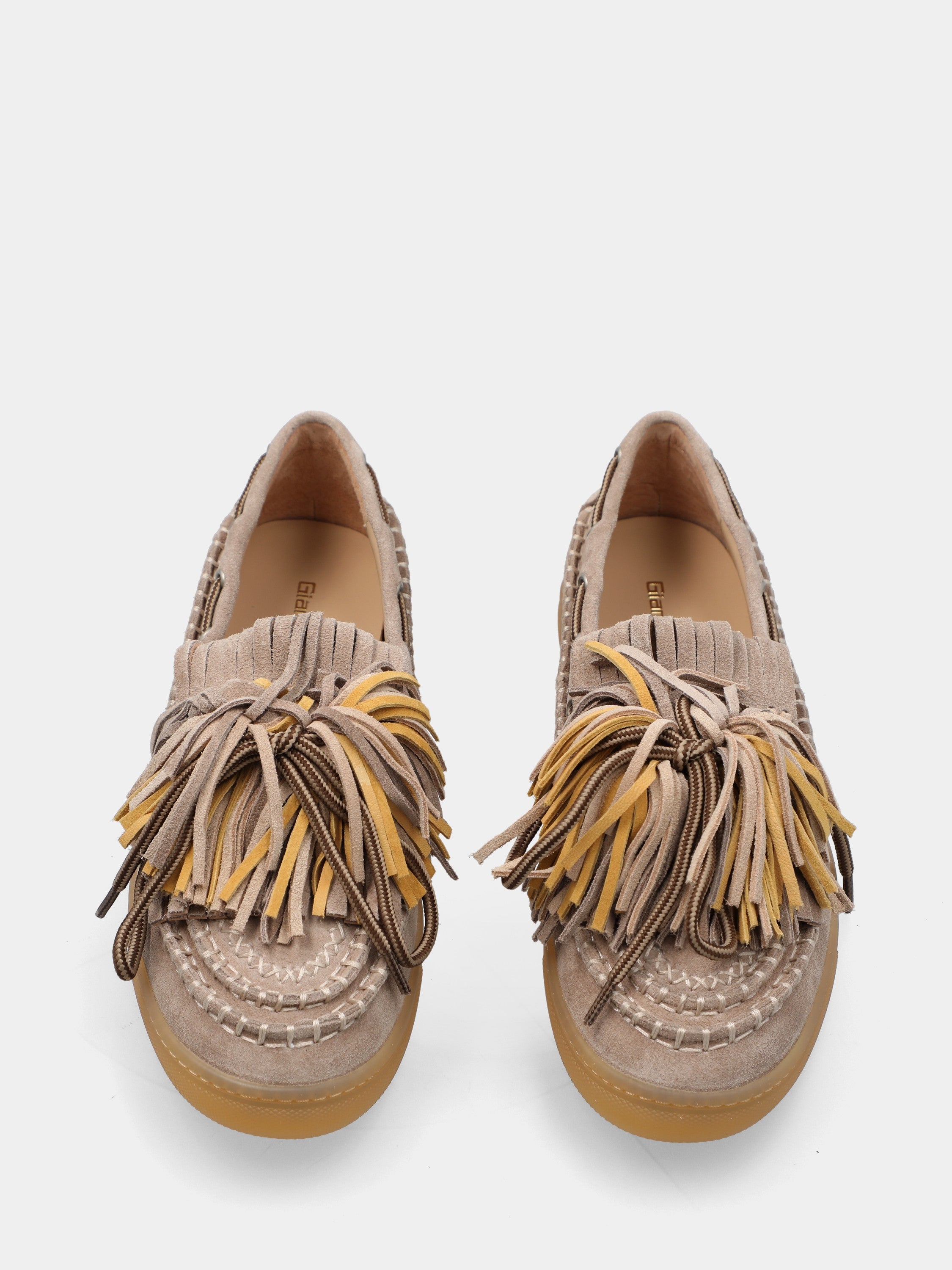 Mocassin en velours beige avec franges, pompons et semelle carrée