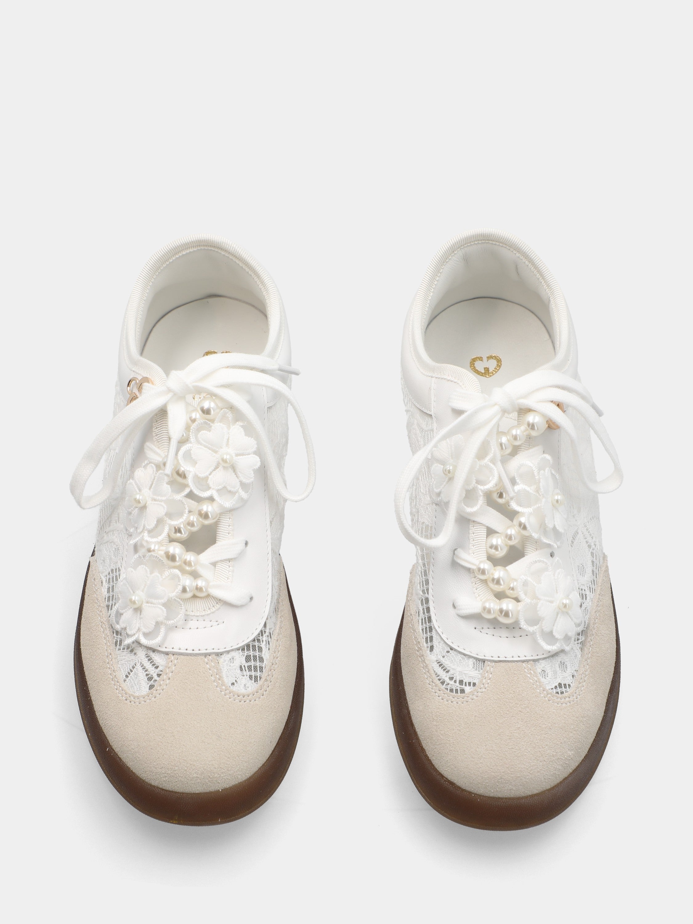 Sneaker in camoscio bianco con ricamo floreale