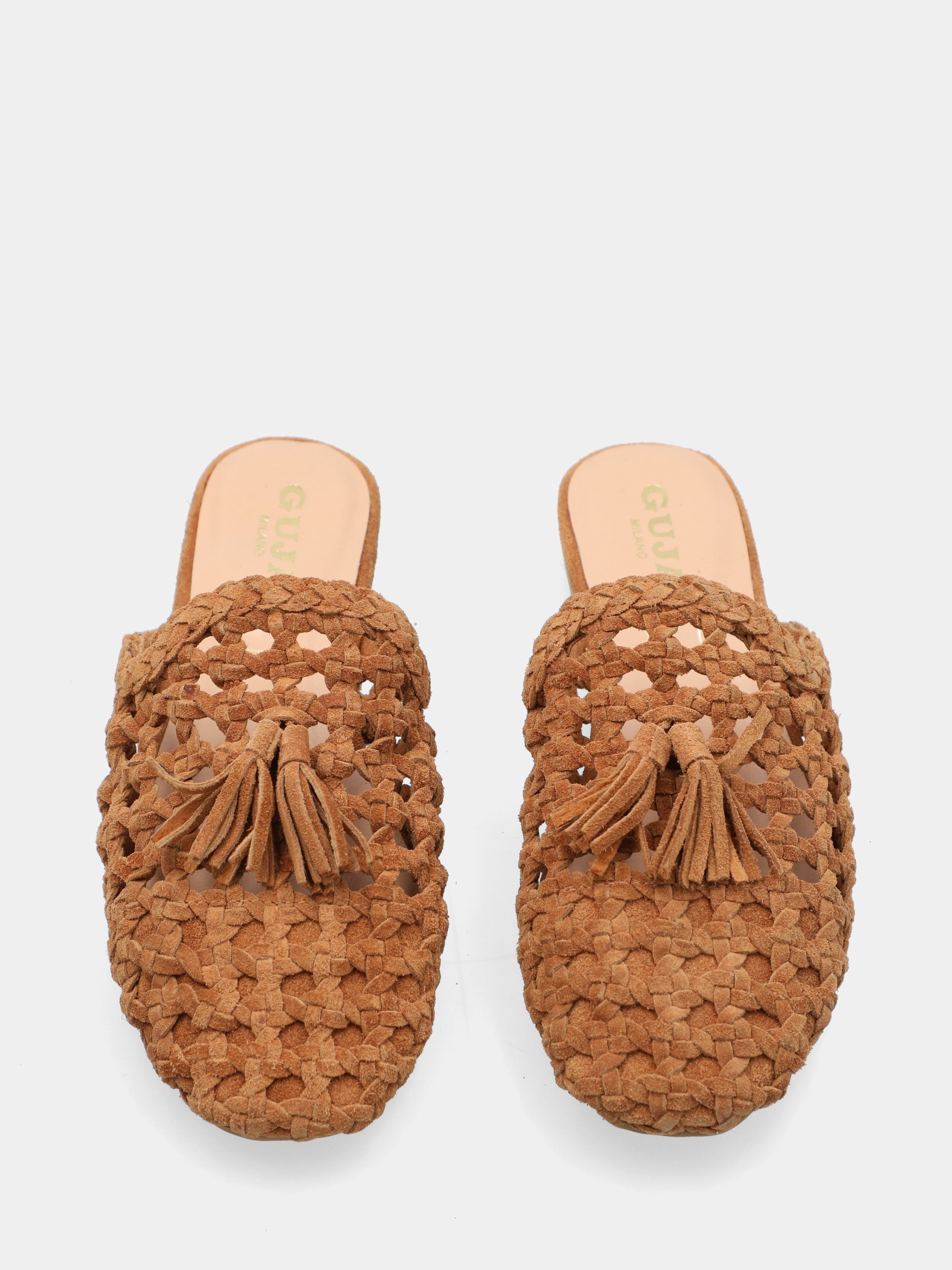 Sabot en suède couleur cuir tressé avec pompons