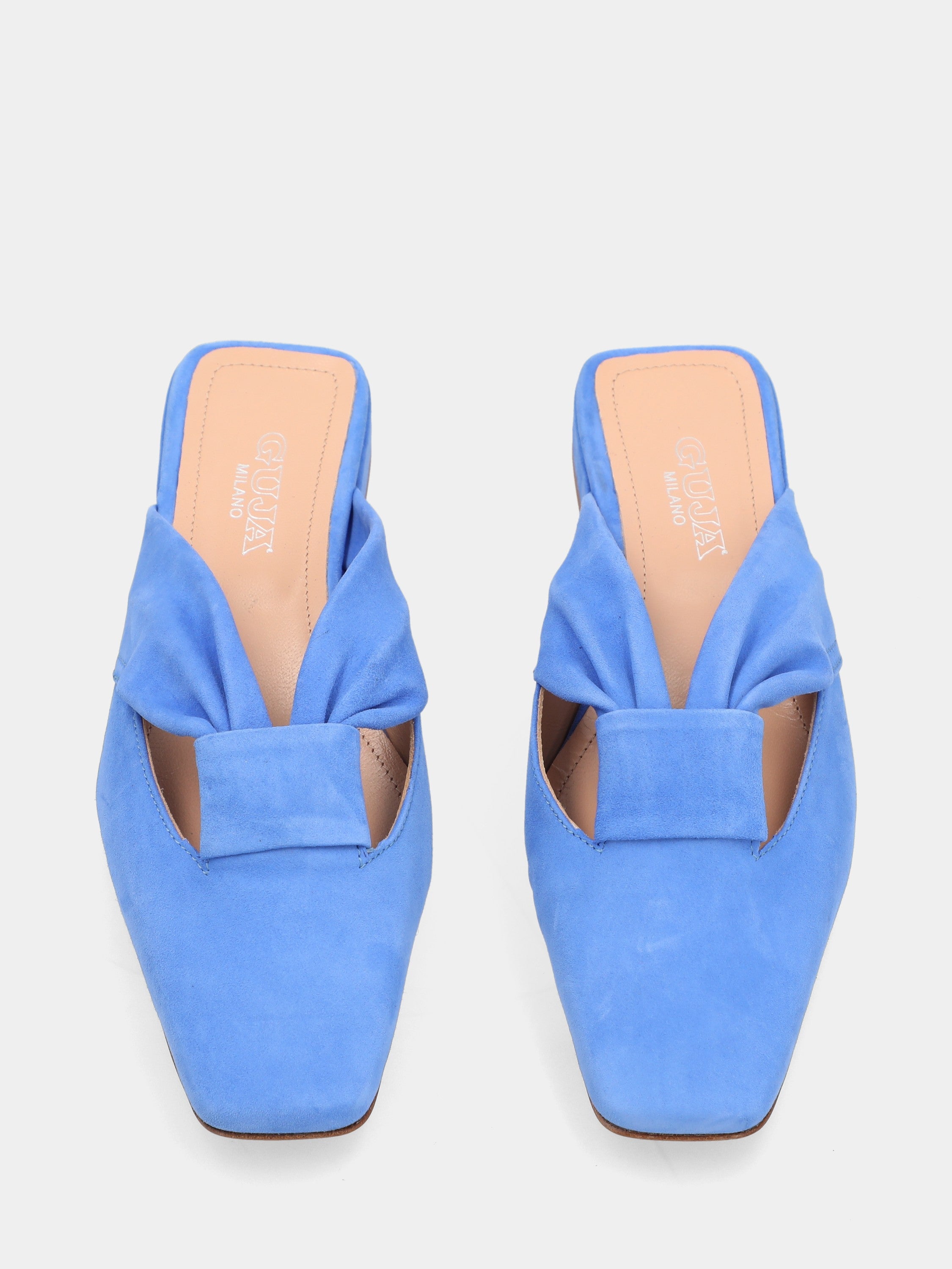 Blue suede clogs with knot and square toe
