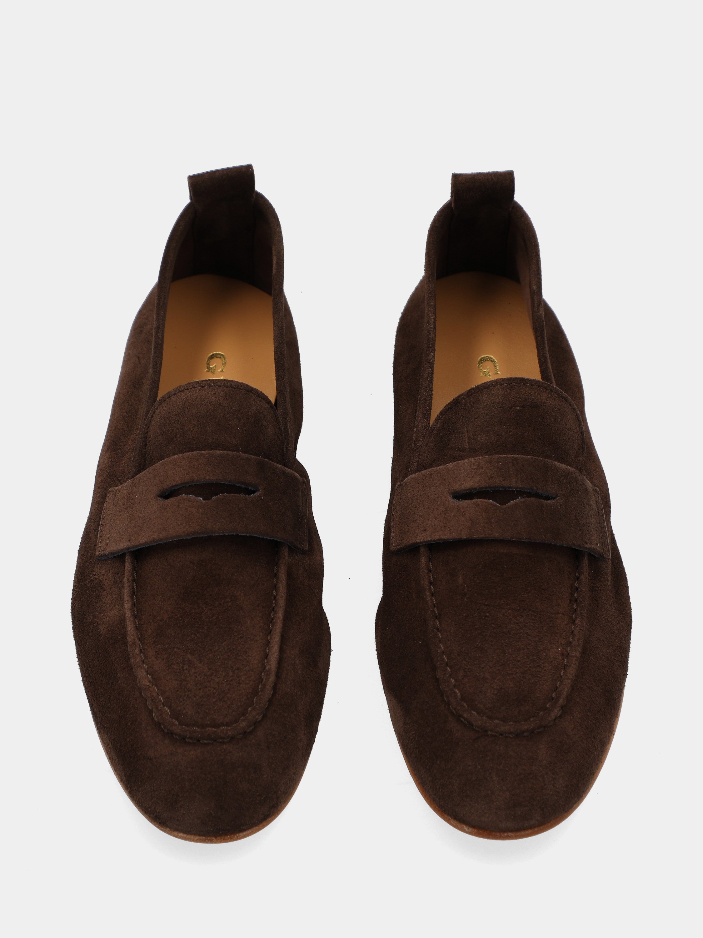 Dark brown velour moccasin with lion mouth mask detail