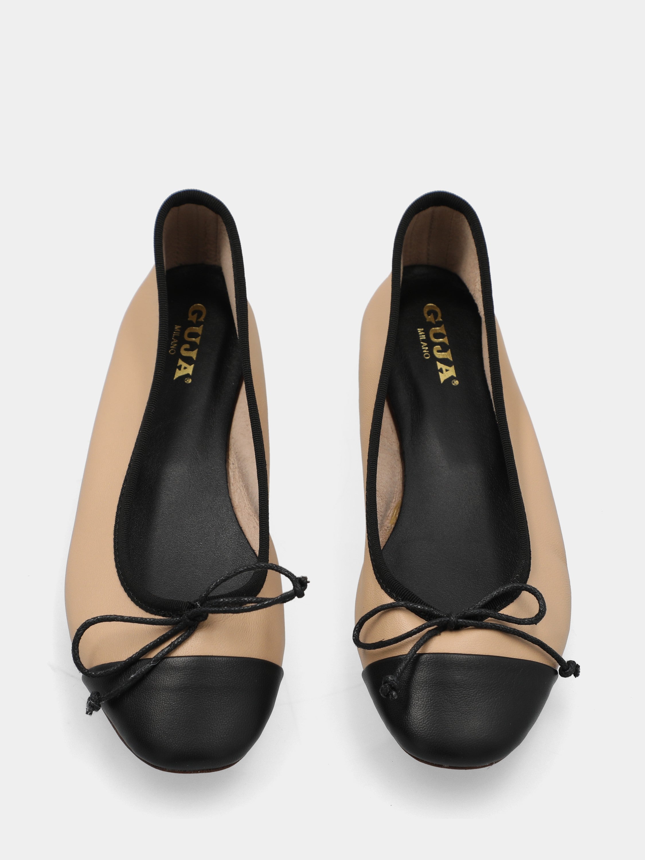 Ballerina in nappa bicolore nero e crema con fiocco