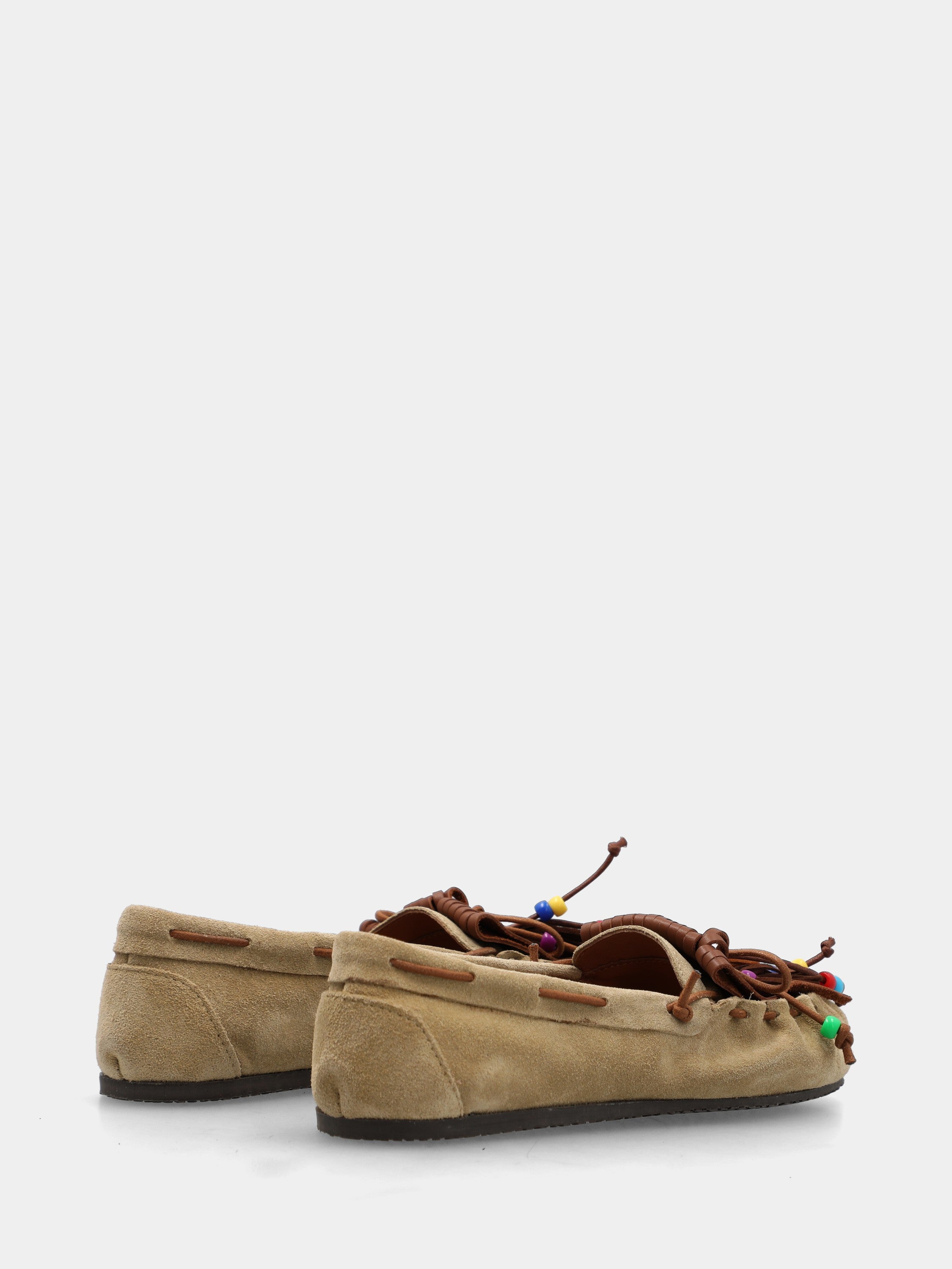 Mocassin en velours beige avec pompons et franges