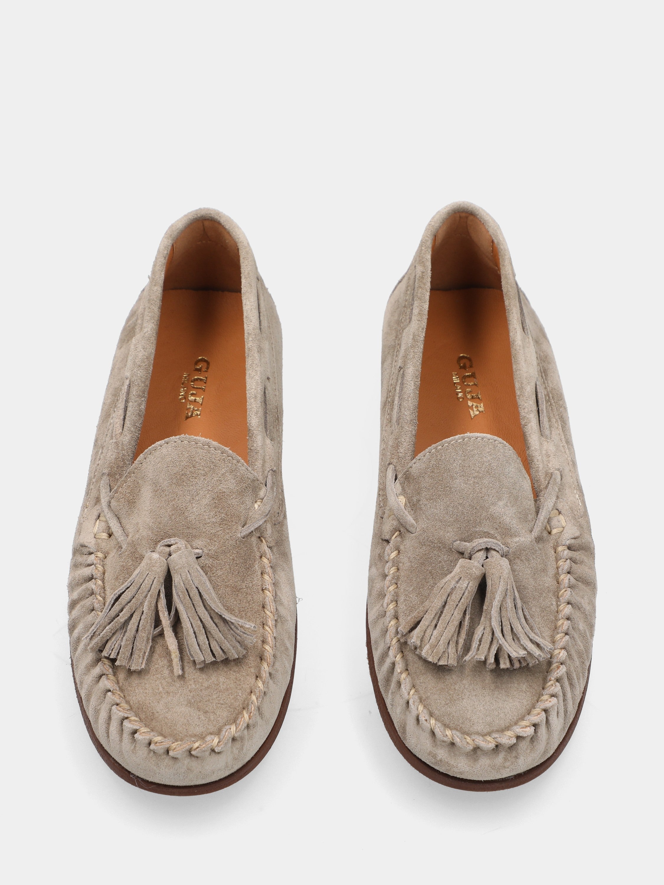 Mocassin en velours beige avec pompons et bout rond