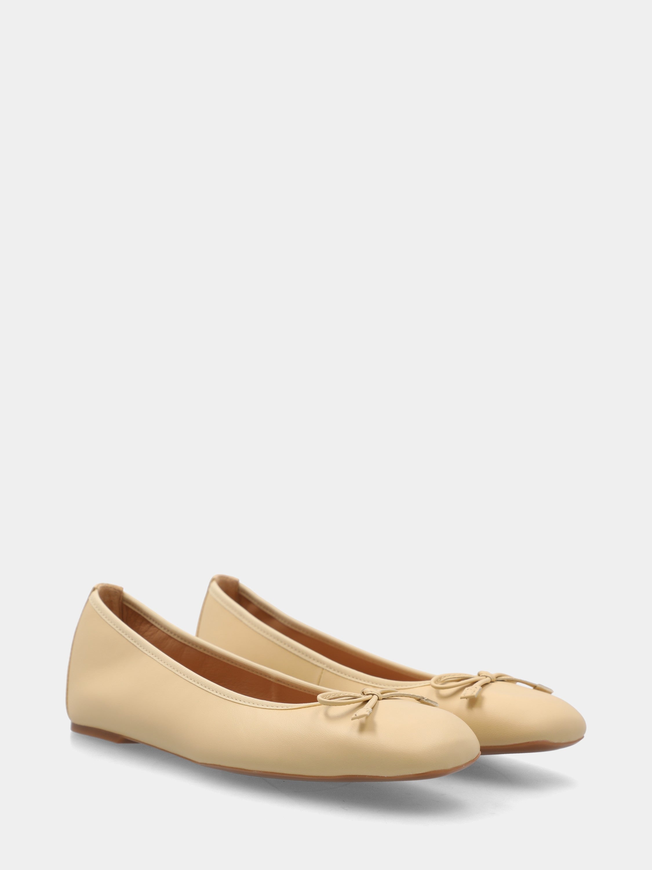 Ballerina in nappa beige con fiocchetto in pianta