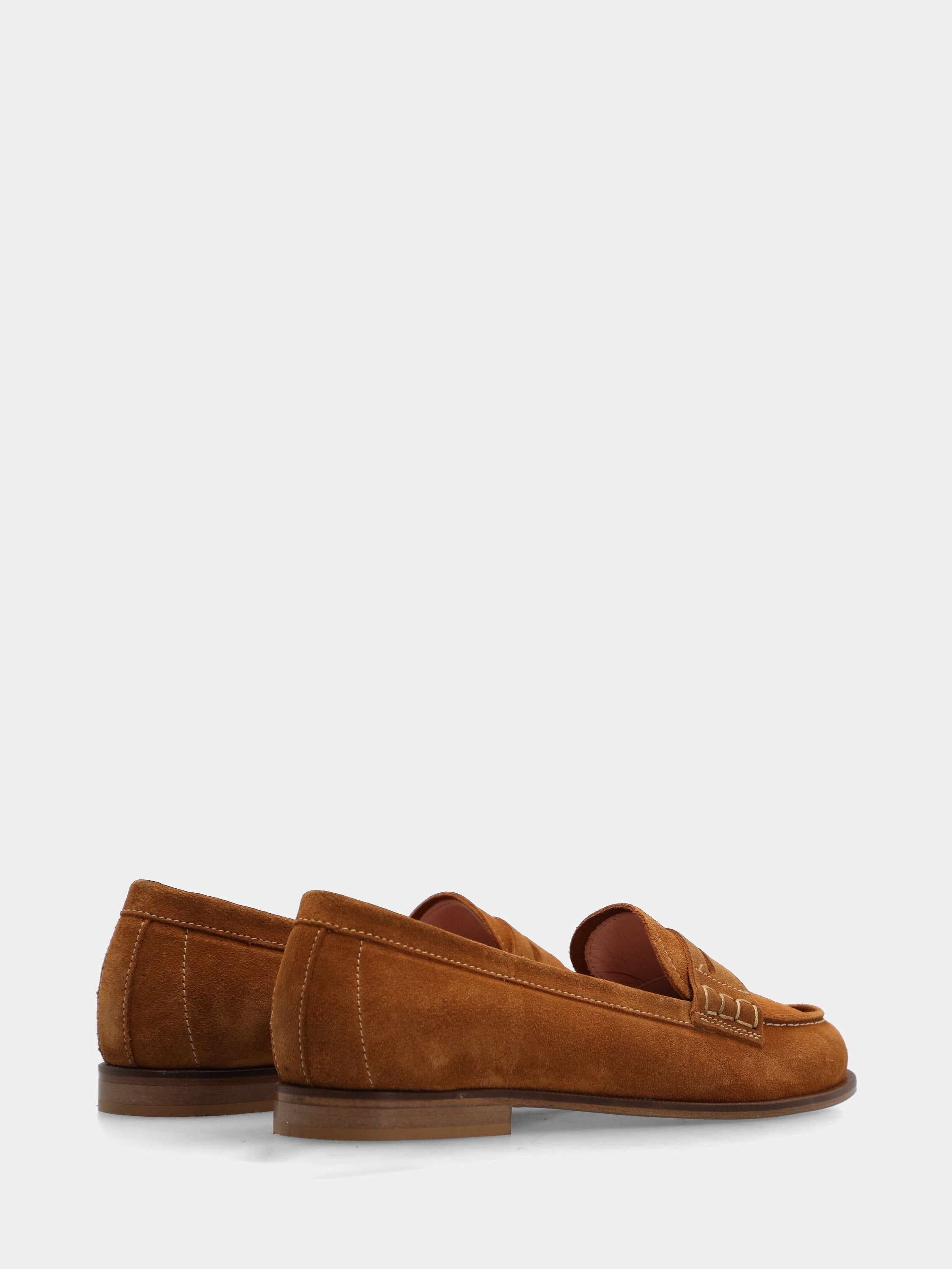 Mocassin en suède couleur cuir avec masque en forme de bouche de lion