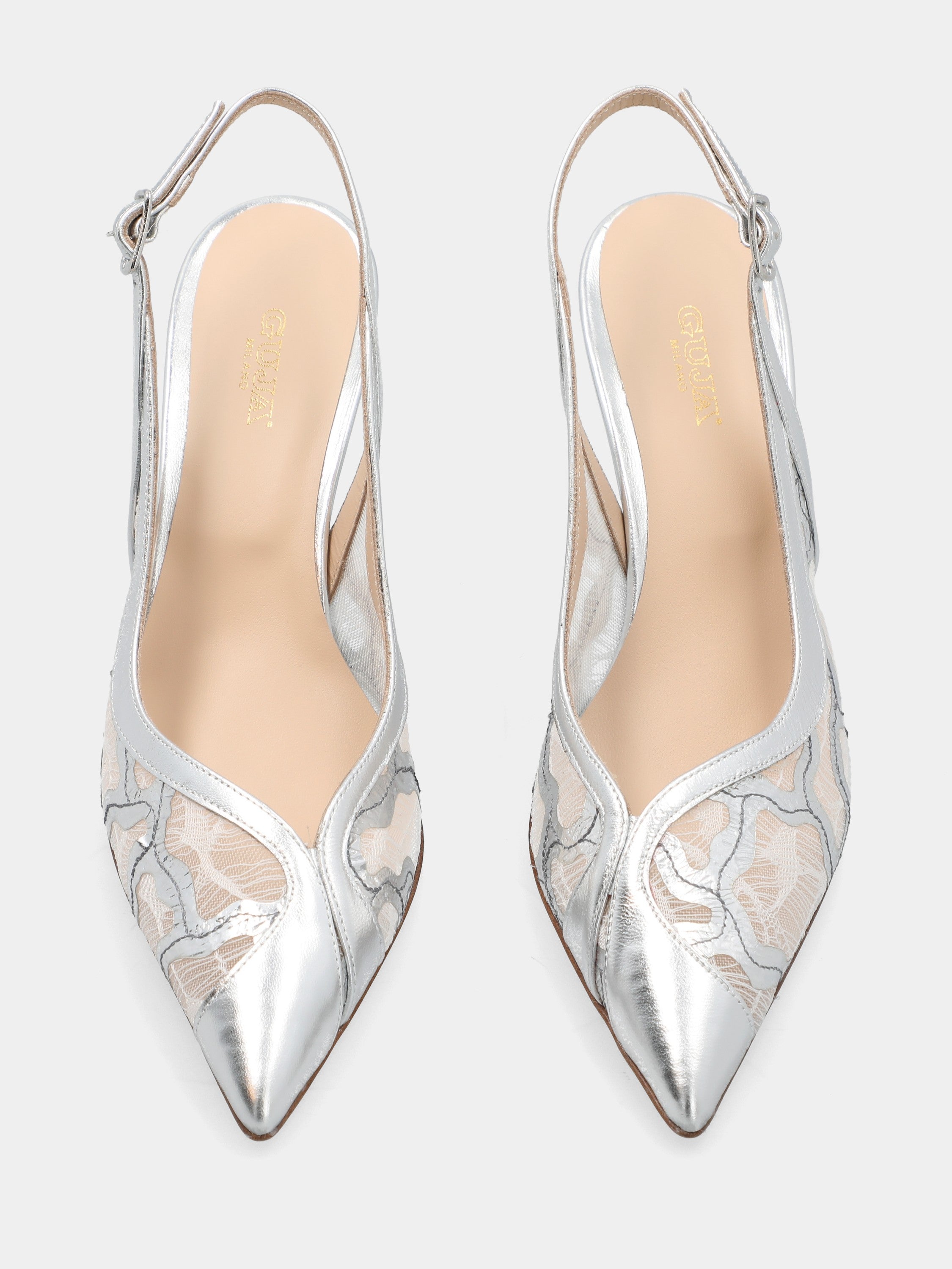 Silver laminated slingback with embroidery and pointed toe