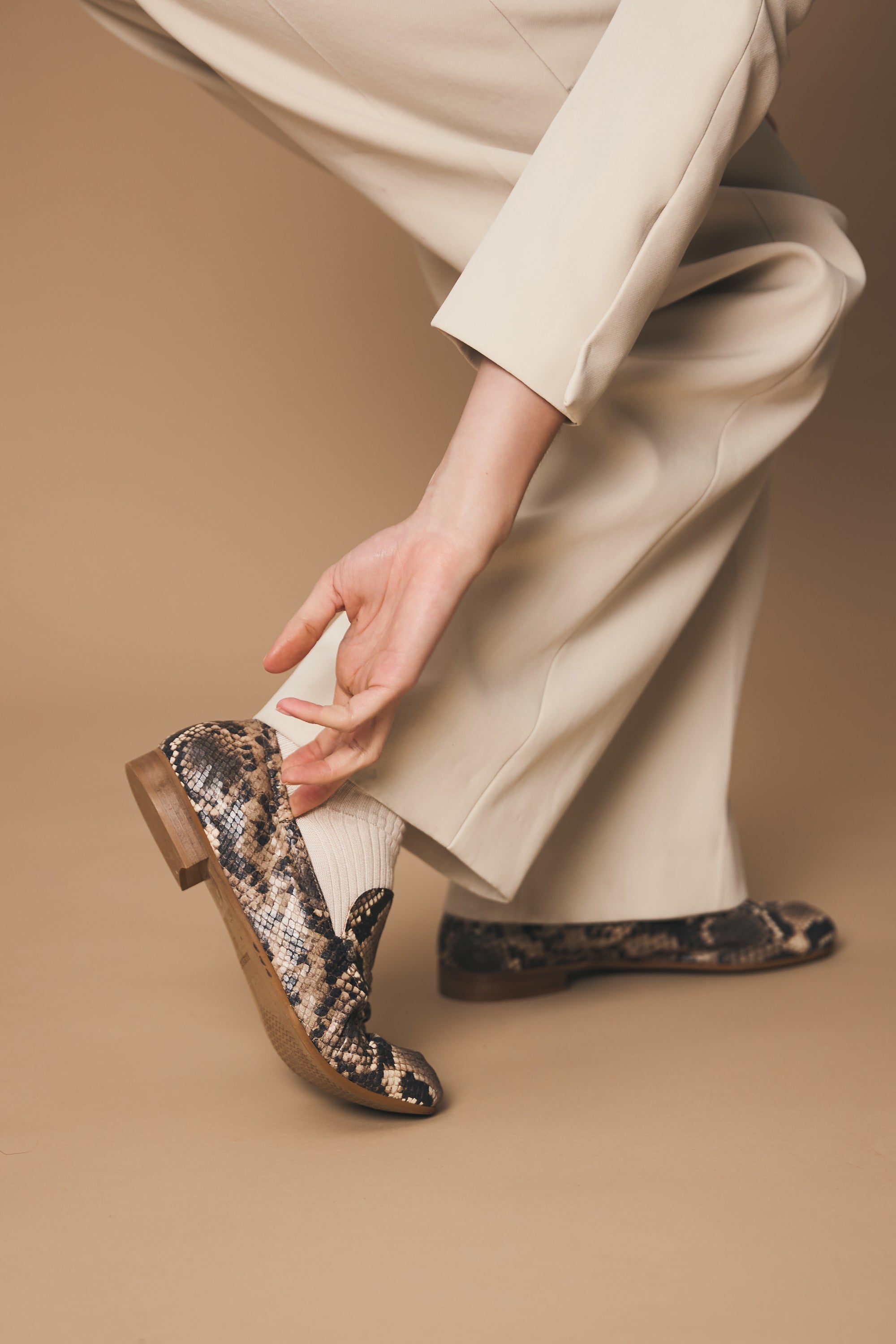 Beige embossed python calfskin loafer