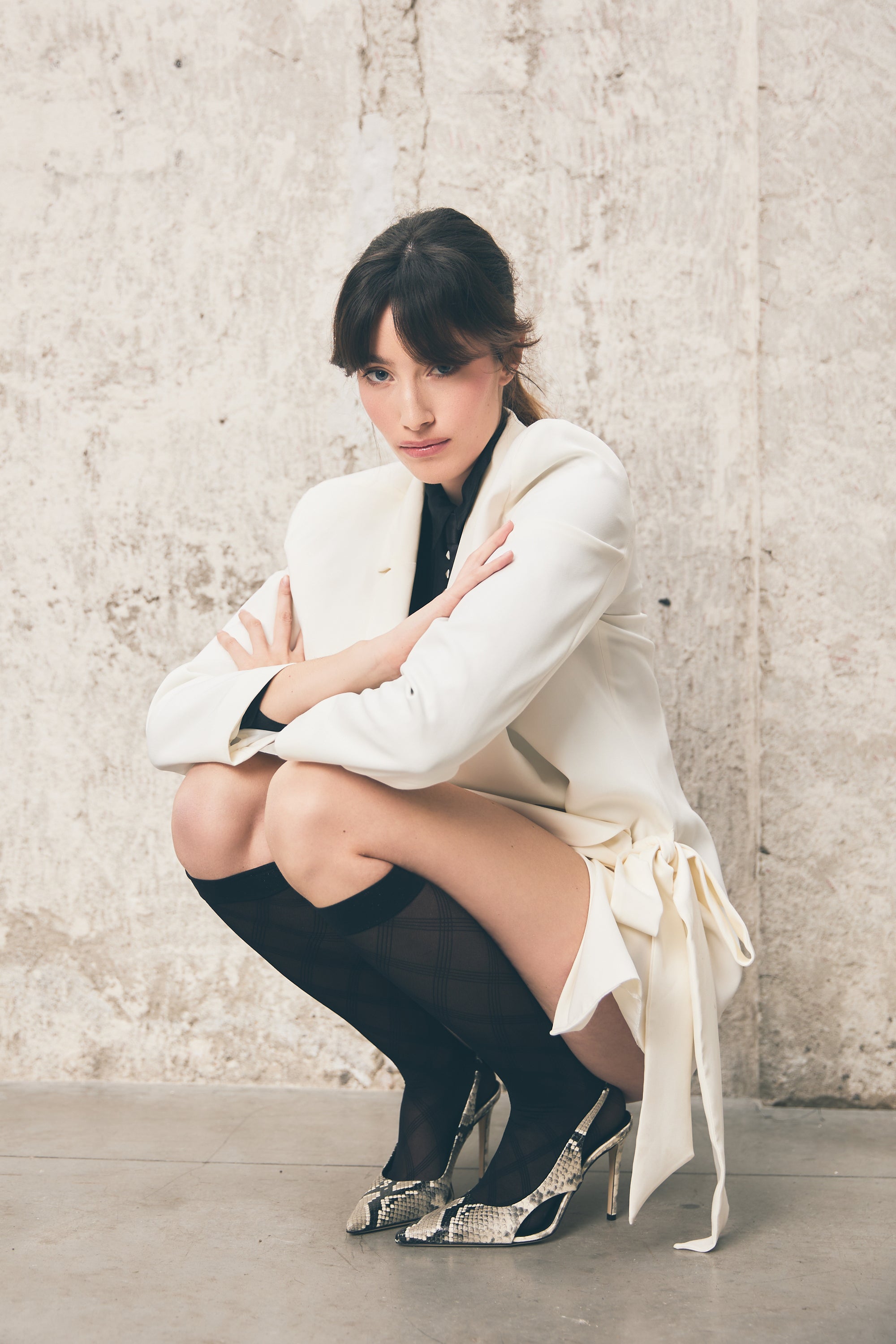 Slingback in vitello stampato pitone con tacco a stiletto