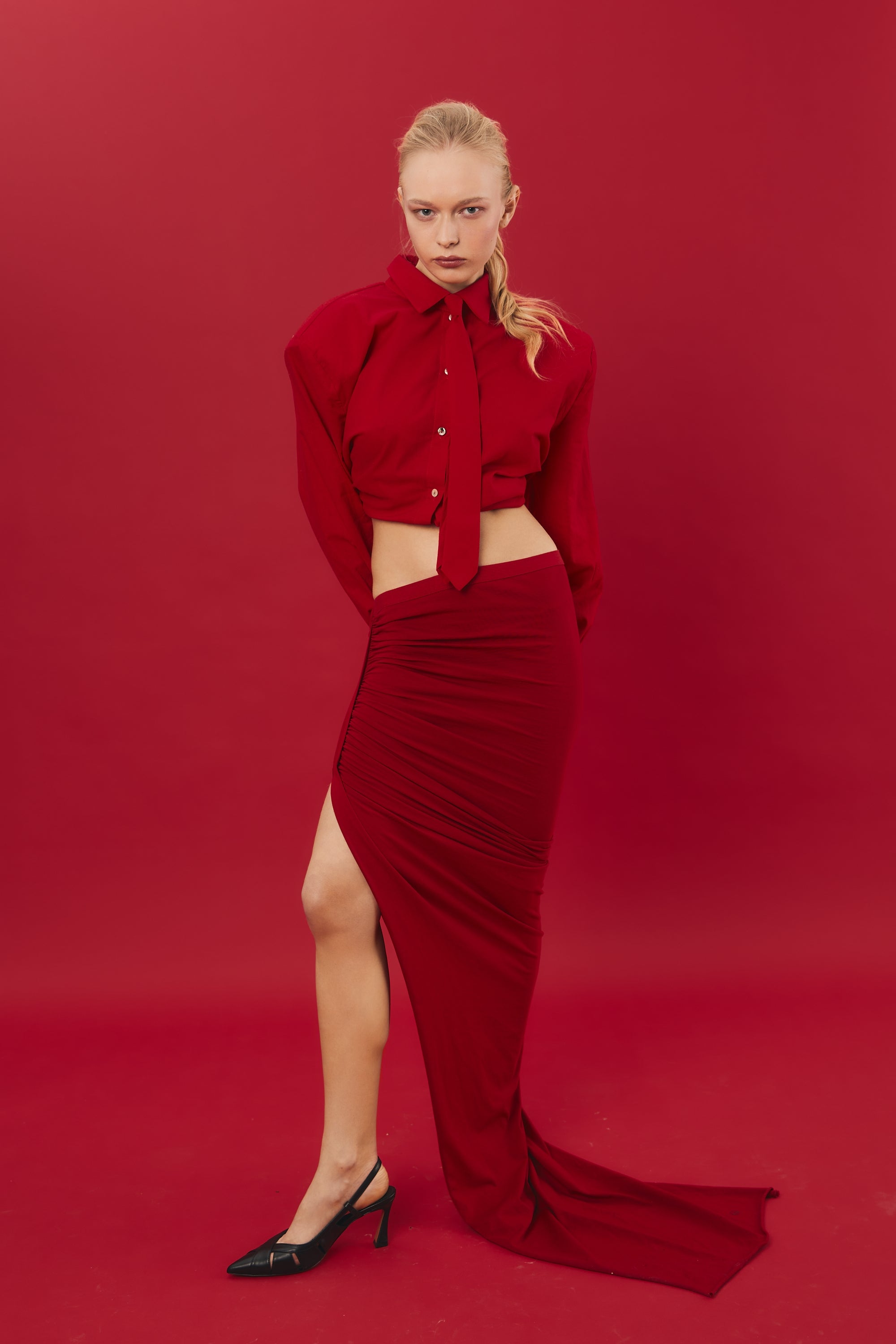 Black nappa slingback with cutouts and 75mm tail heel