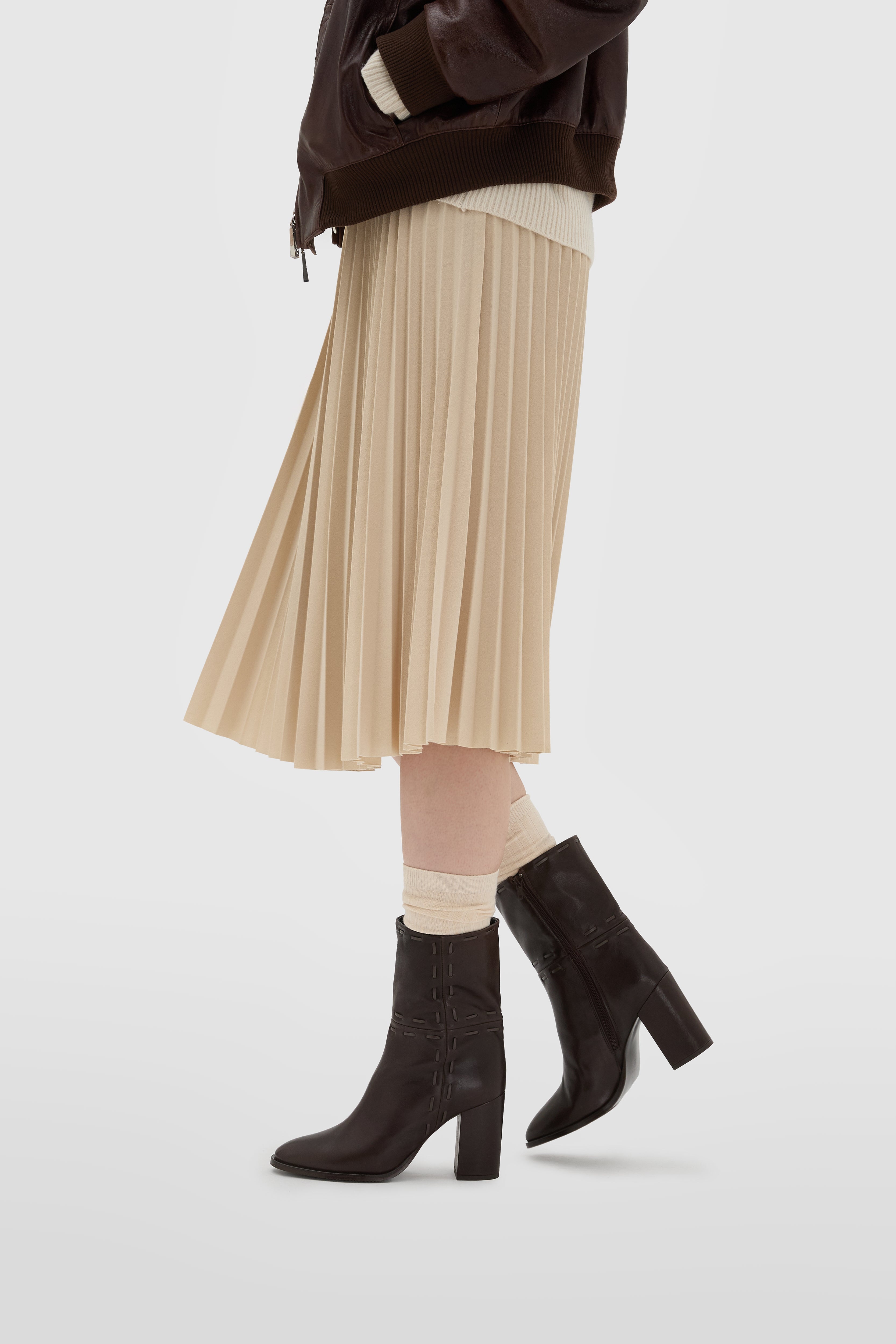 Dark brown nappa leather boot with cross lacing on the shaft