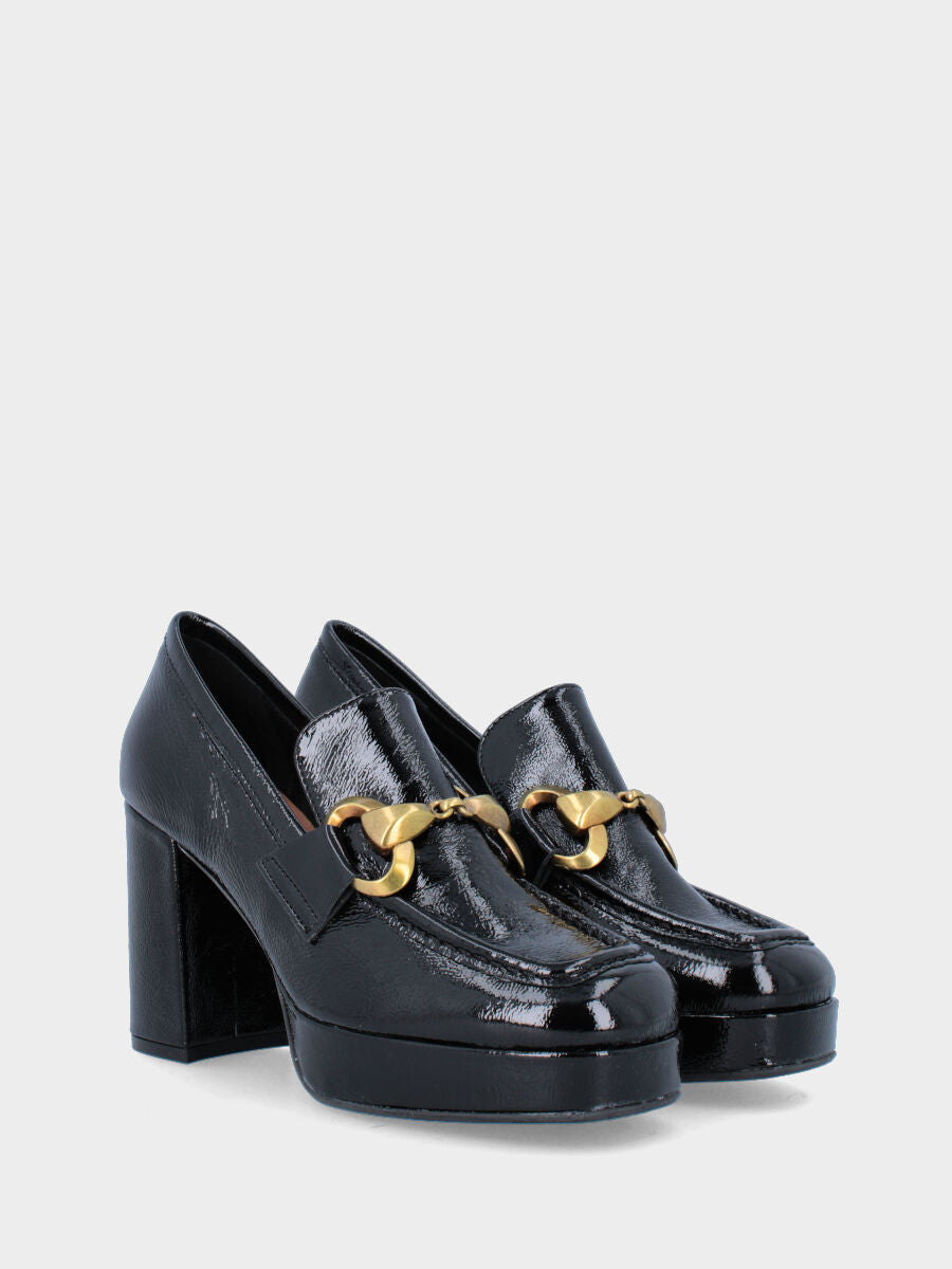 Black leather moccasin with oversized buckle