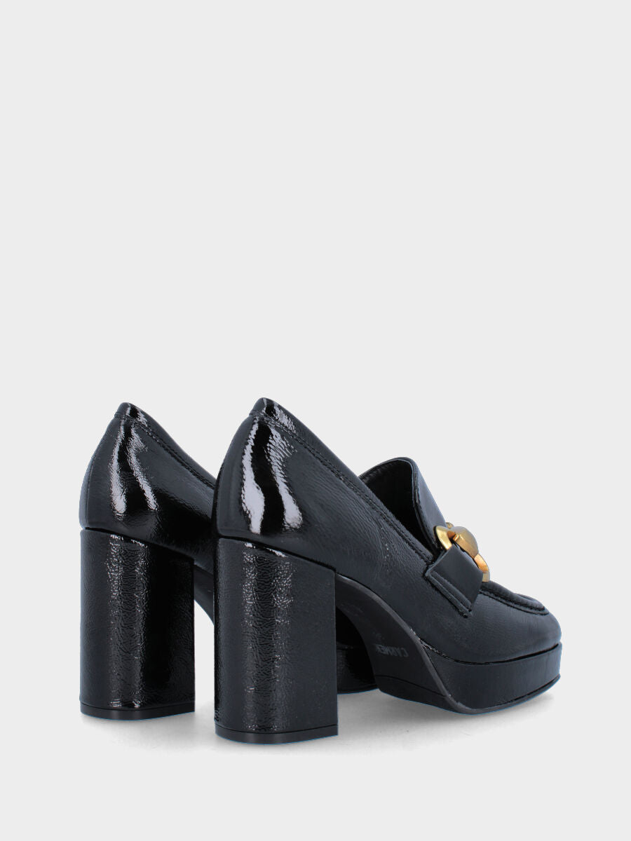 Black leather moccasin with oversized buckle