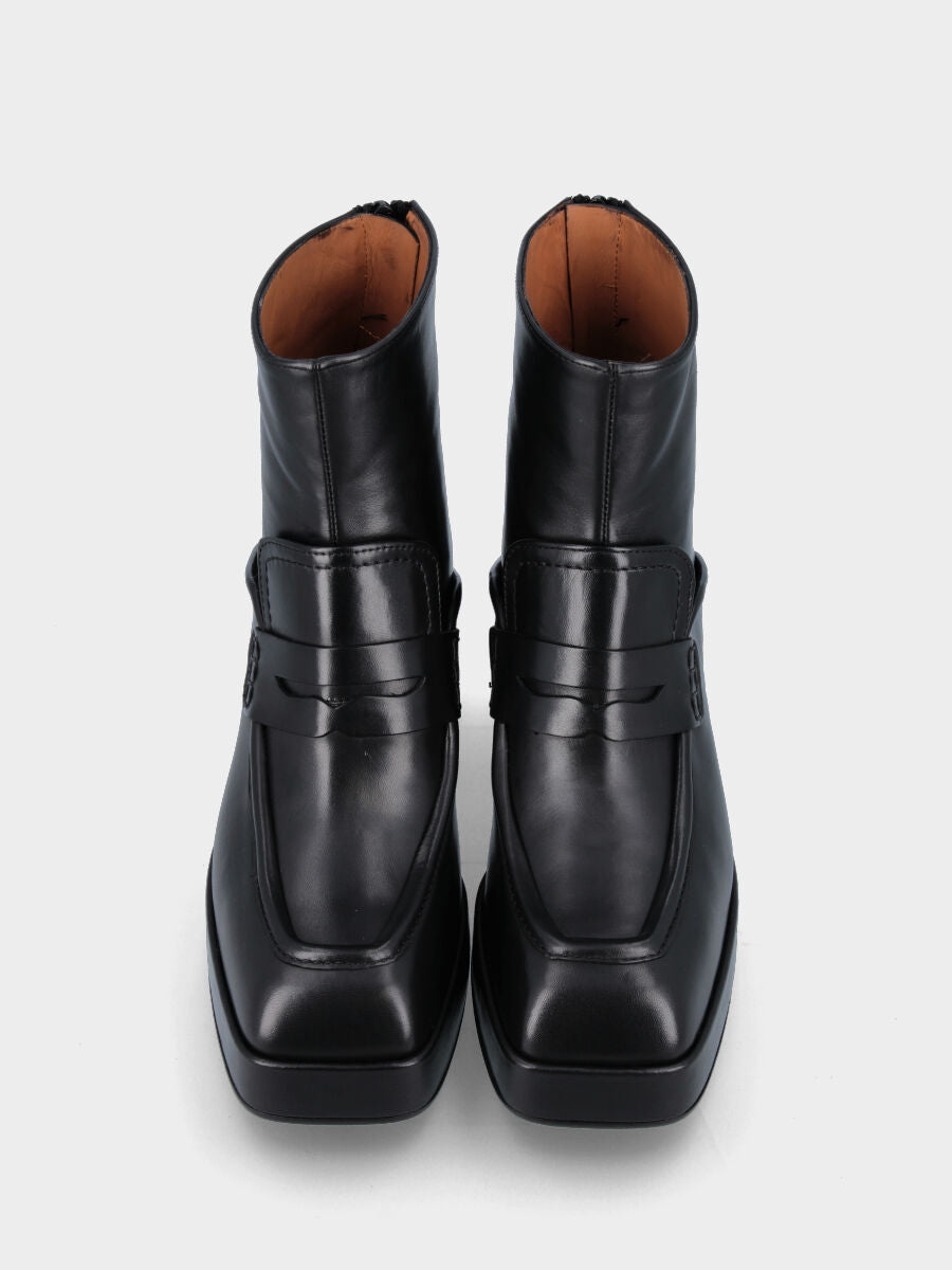 Black leather ankle boot with tab and strap