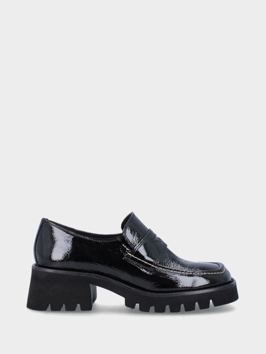 Mocassin noir en cuir avec semelle track et surpiqûres apparentes