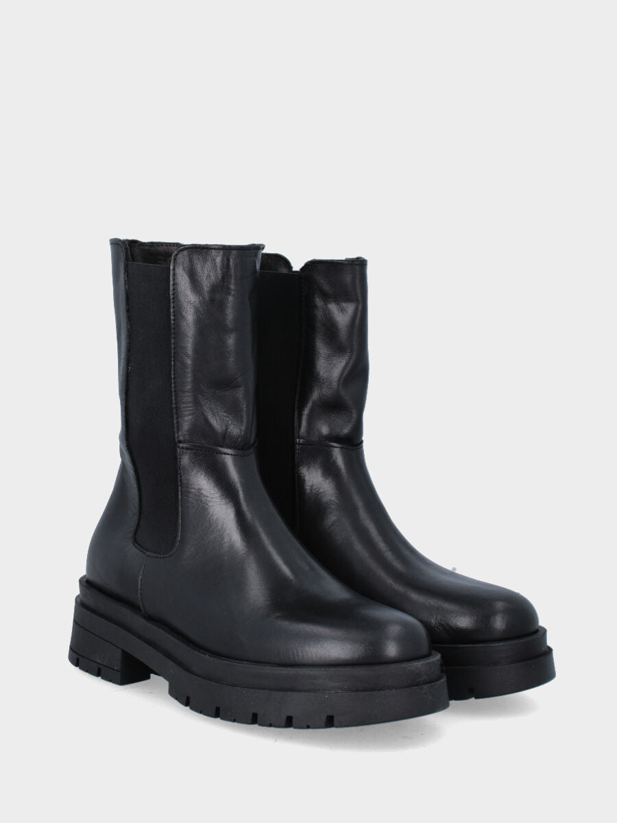 Boot de combat noir en cuir avec semelle crantée et bande élastique