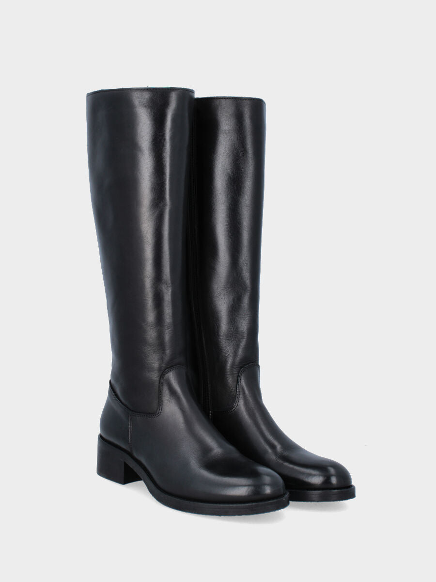 Botte noire en cuir avec fermeture éclair le long de la tige