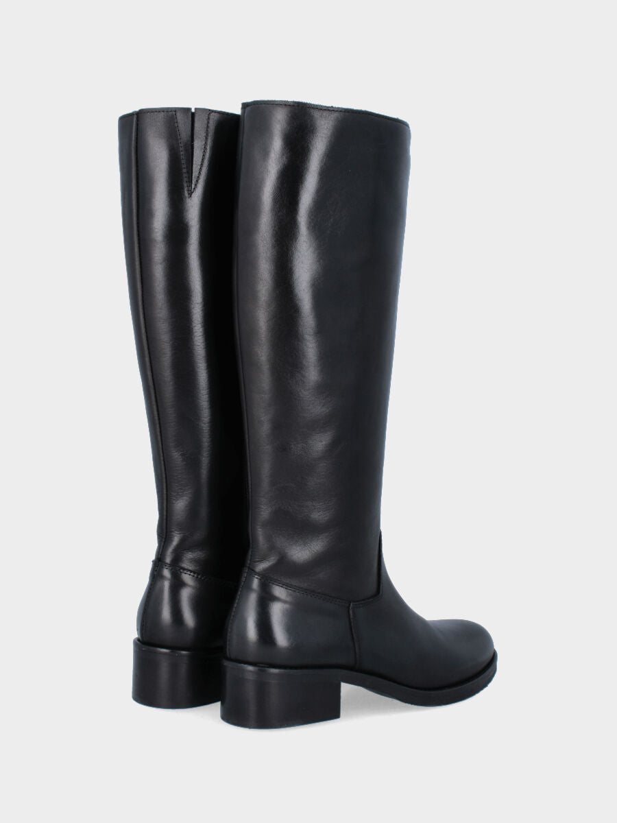 Botte noire en cuir avec fermeture éclair le long de la tige