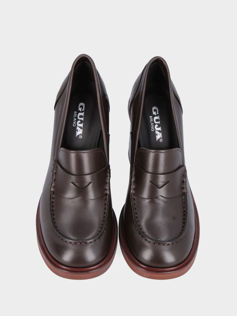 Brown leather moccasin with wide heel
