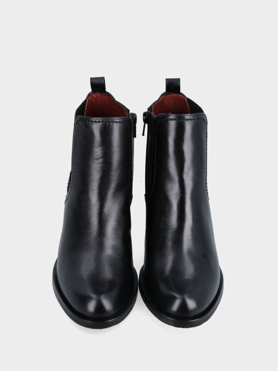 Black leather ankle boot with heel and monoblock sole