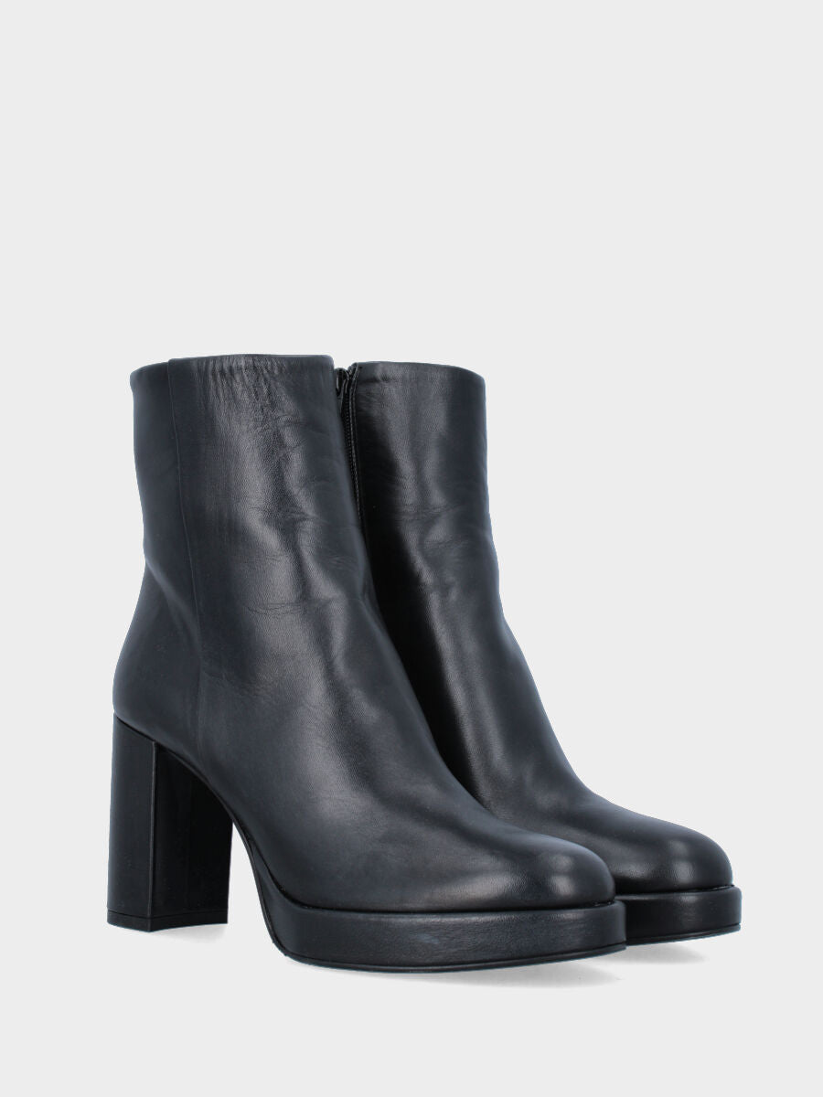 Black leather ankle boot with round toe and platform